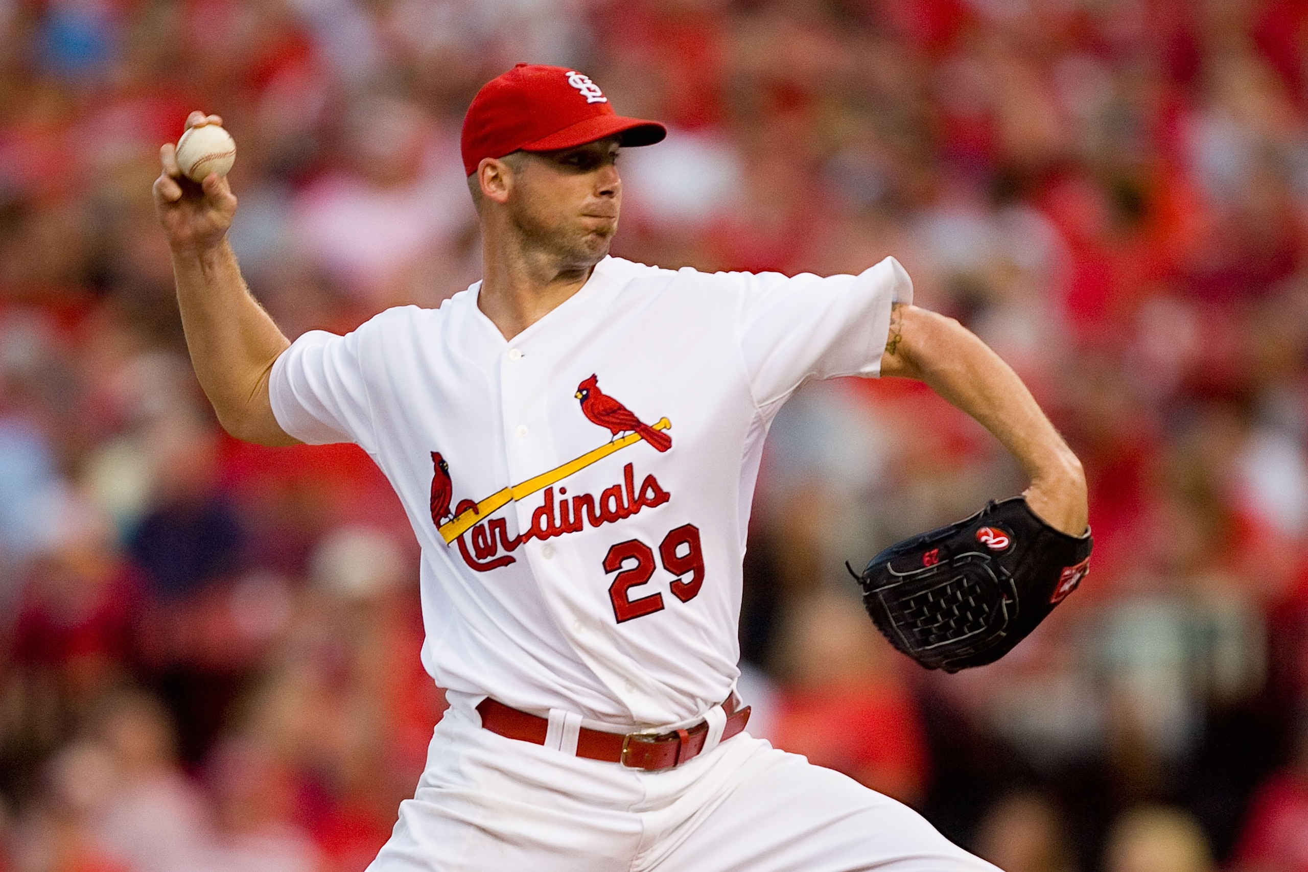 ST. LOUIS - AUGUST 21: Starter Chris Carpenter #29 of the St. Louis Cardinals pitches against the San Francisco Giants at Busch Stadium on August 21, 2010 in St. Louis, Missouri.  (Photo by Dilip Vishwanat/Getty Images)