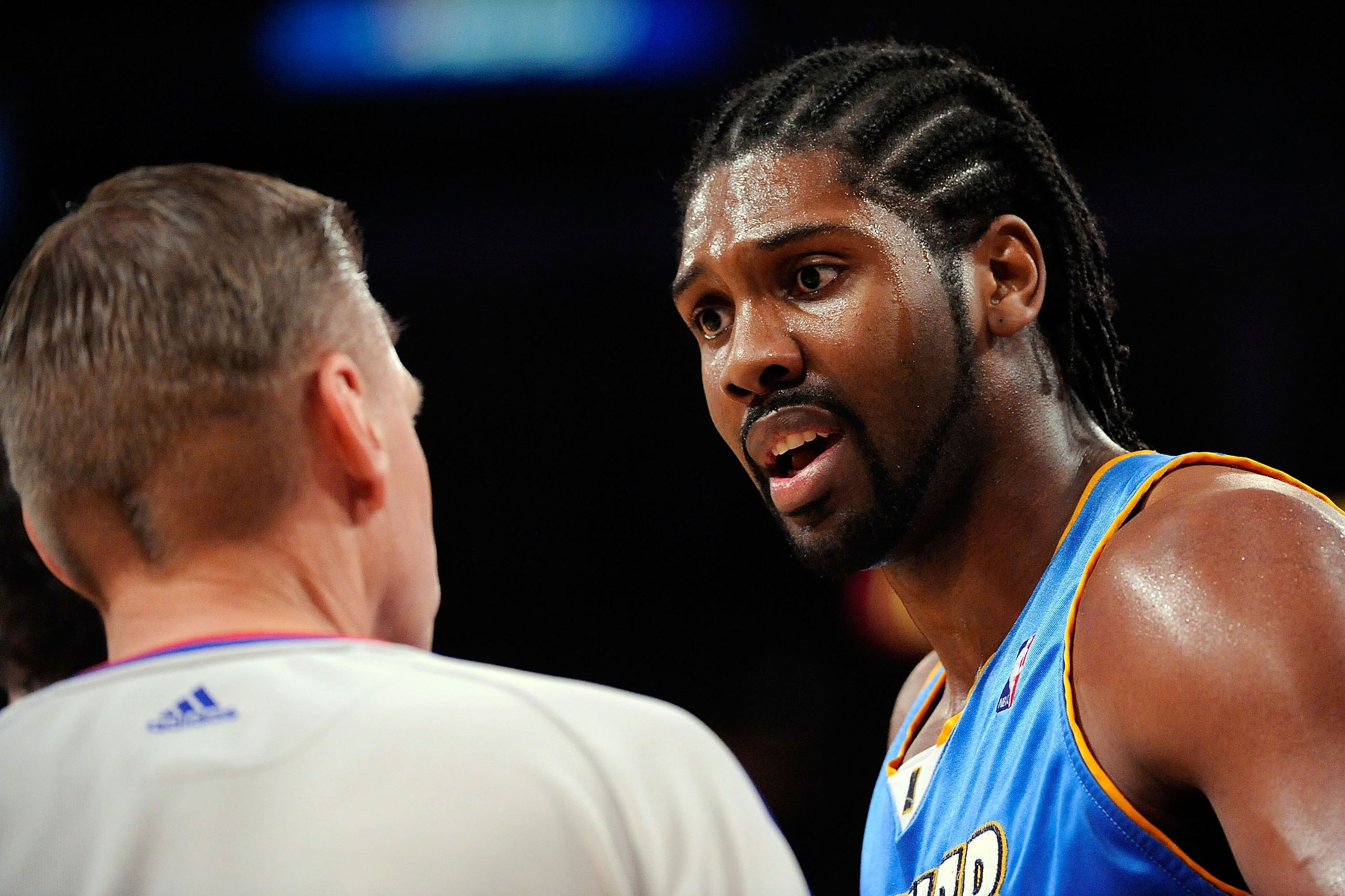 LOS ANGELES, CA - MAY 21:  Nene #31 of the Denver Nuggets talks with referee Steve Javie #29 in the third quarter of Game Two of the Western Conference Finals during the 2009 NBA Playoffs at Staples Center on May 21, 2009 in Los Angeles, California. NOTE