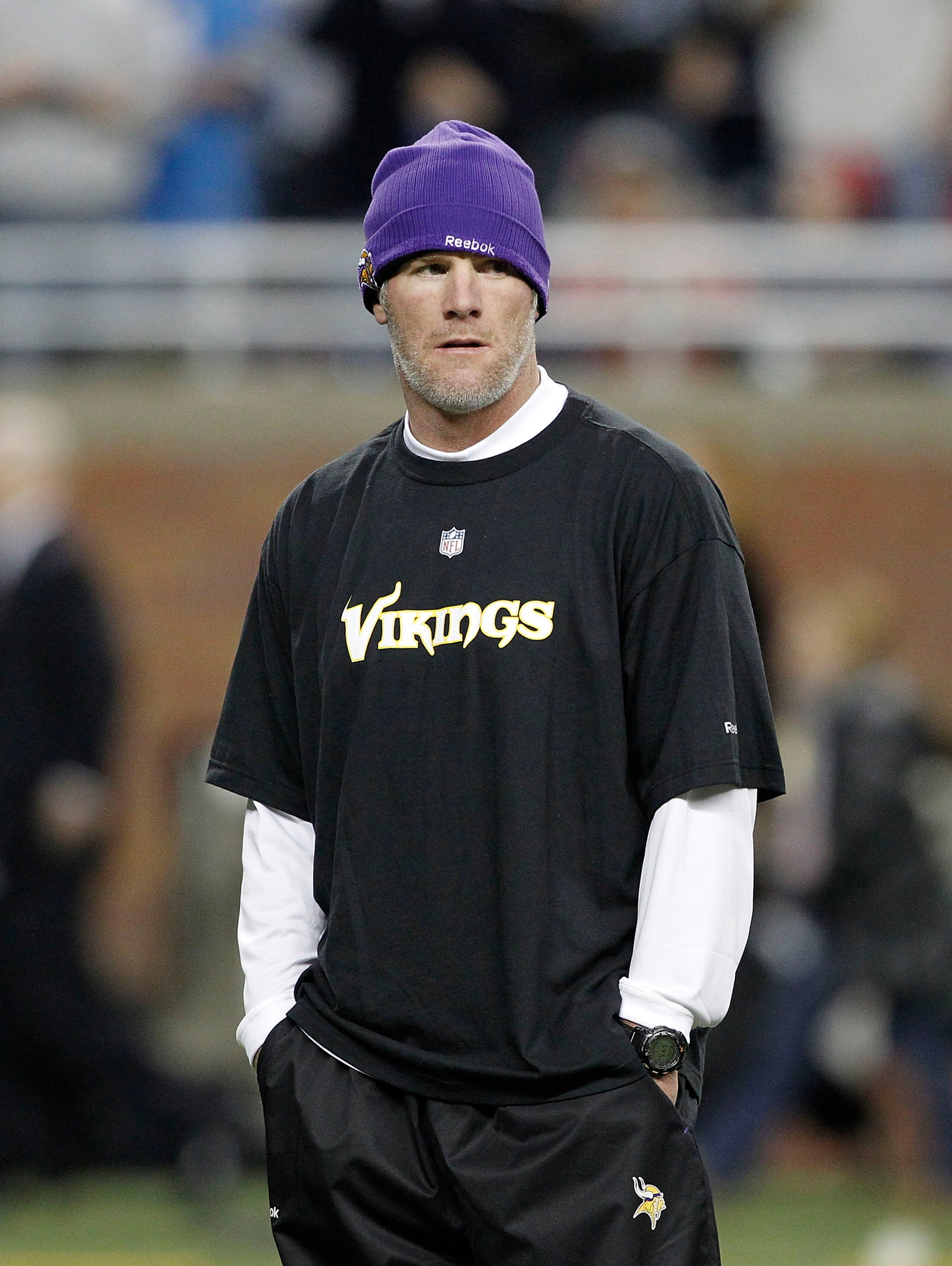 DETROIT, MI - DECEMBER 13: Brett Favre #4 of the Minnesota Vikings walks on the field during pre-game warm ups and will not dress for the game against the New York Giants on December 13, 2010 in Detroit, Michigan. (Photo by Leon Halip/Getty Images)