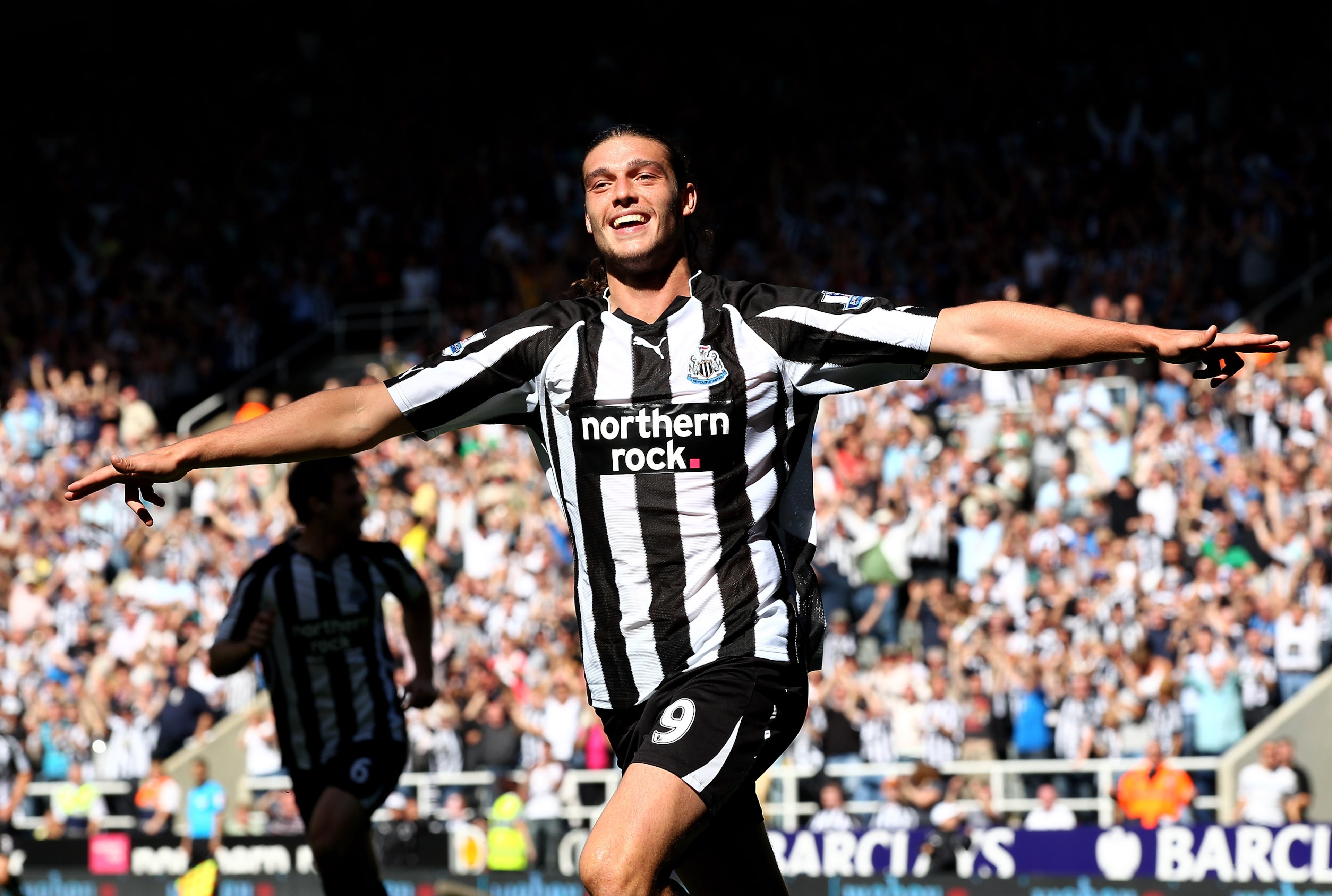 NEWCASTLE UPON TYNE, ENGLAND - AUGUST 22: Andy Carroll of Newcastle United celebrates scoring his teams fourth goal during the Barclays Premier League match between Newcastle United and Aston Villa at St James' Park on August 22, 2010 in Newcastle upon T NEWCASTLE UPON TYNE, ENGLAND - AUGUST 22: Andy Carroll of Newcastle United celebrates scoring his teams fourth goal during the Barclays Premier League match between Newcastle United and Aston Villa at St James' Park on August 22, 2010 in Newcastle upon T