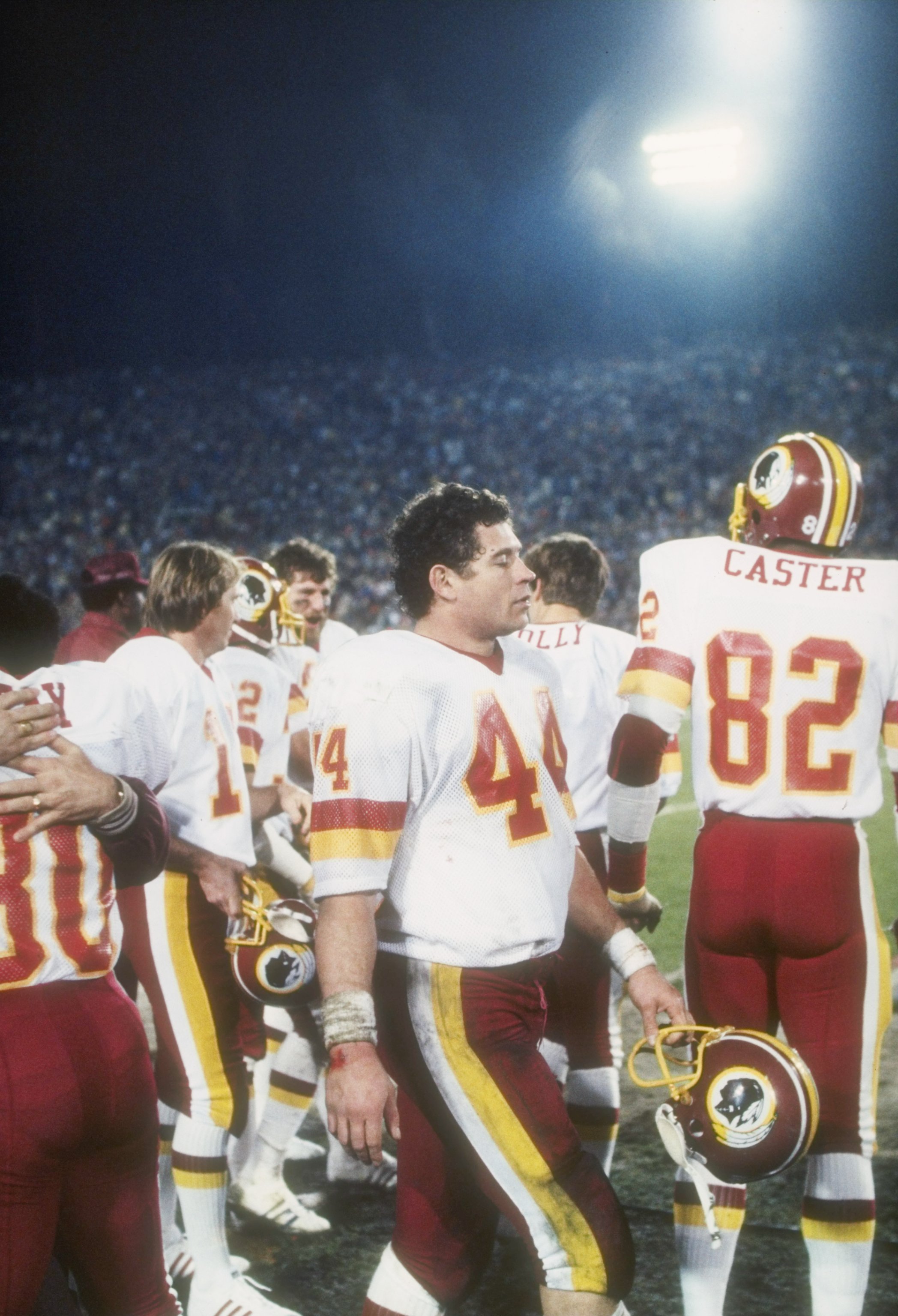 Closeup of New York Jets John Riggins on sidelines during game vs