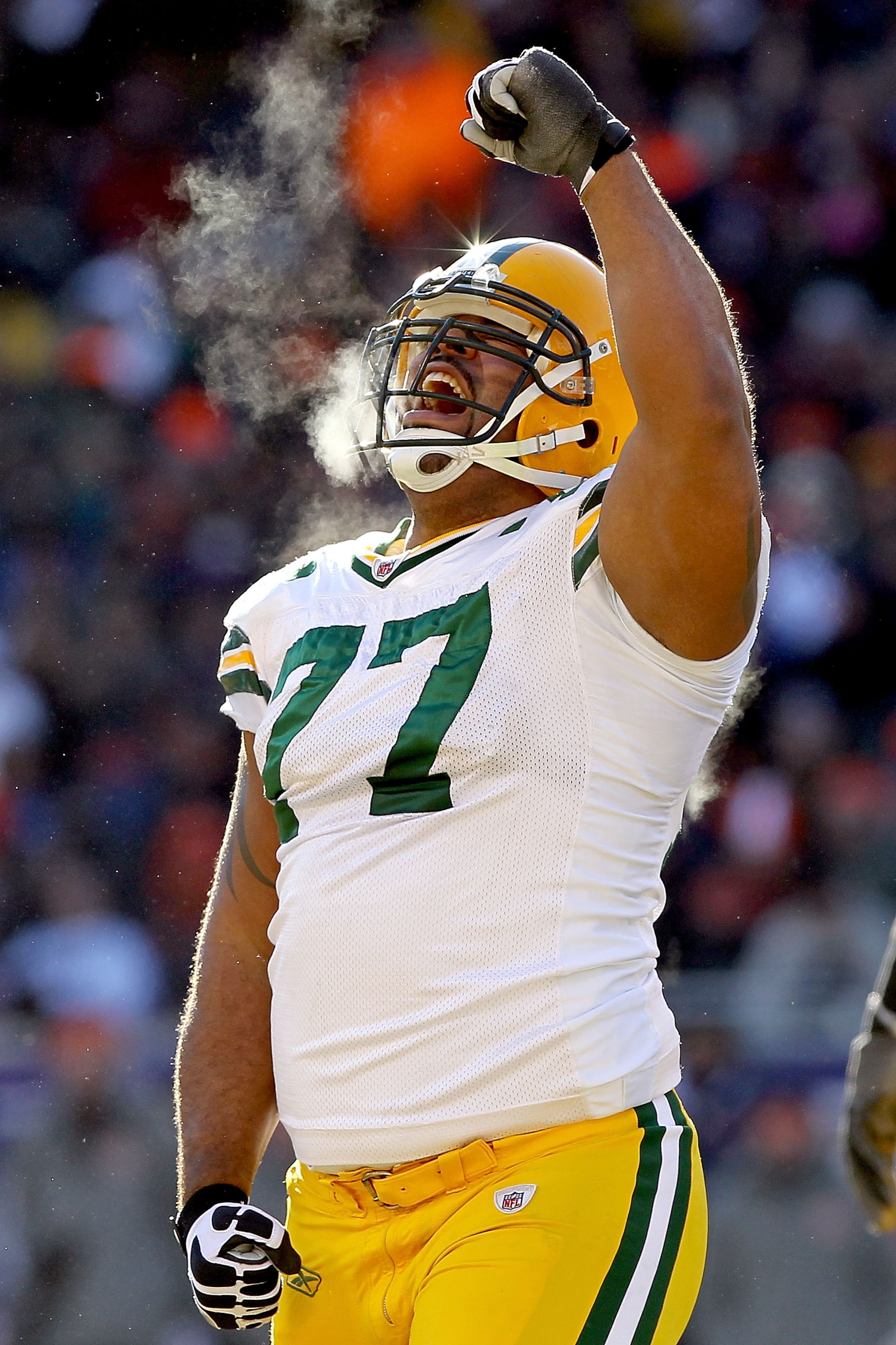 CHICAGO, IL - JANUARY 23: Cullen Jenkins #77 of the Green Bay Packers reacts after a sack of quarterback Jay Cutler #6 of the Chicago Bears in the first half in the NFC Championship Game at Soldier Field on January 23, 2011 in Chicago, Illinois. (Photo CHICAGO, IL - JANUARY 23: Cullen Jenkins #77 of the Green Bay Packers reacts after a sack of quarterback Jay Cutler #6 of the Chicago Bears in the first half in the NFC Championship Game at Soldier Field on January 23, 2011 in Chicago, Illinois. (Photo