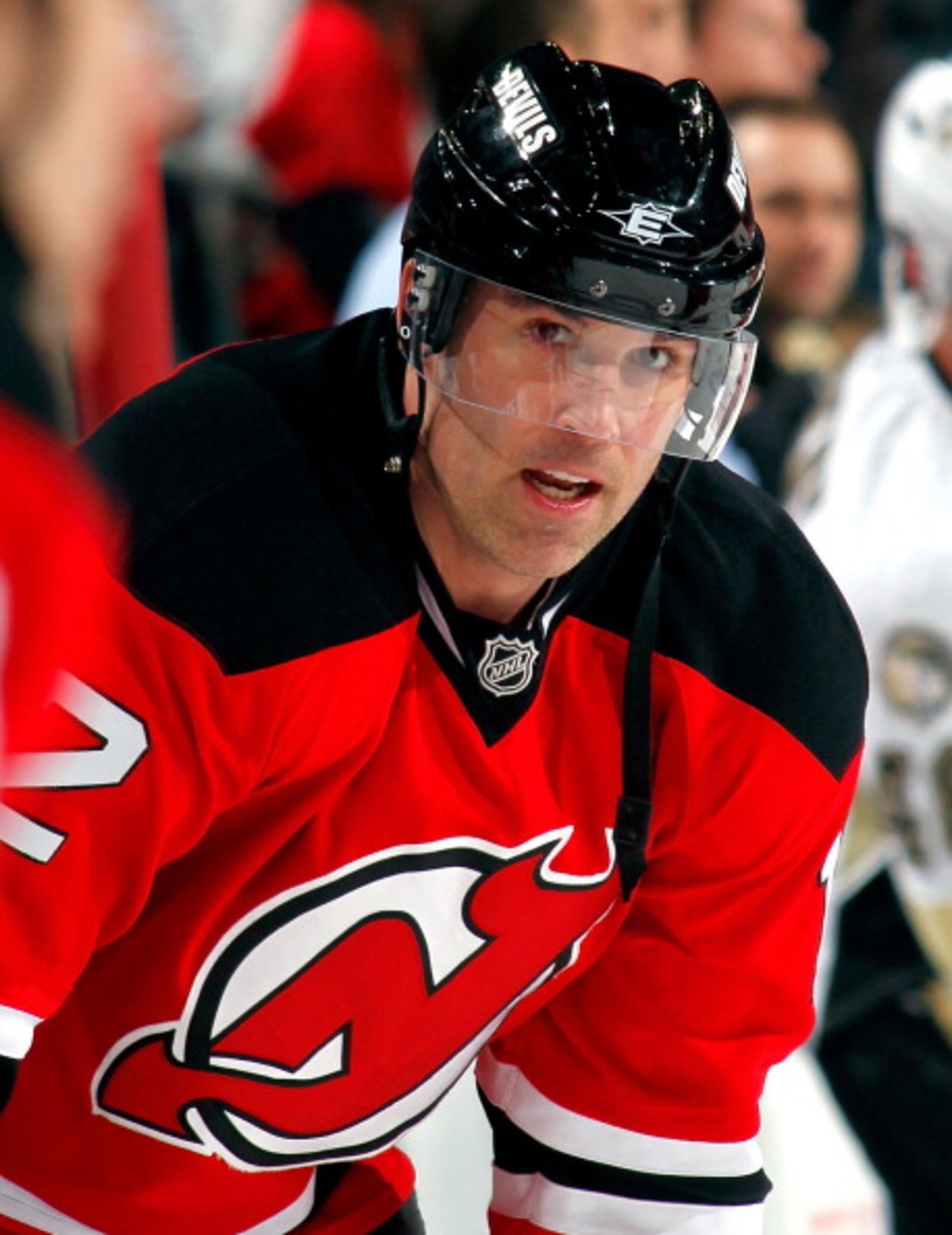 NEWARK, NJ - JANUARY 20:  Brian Rolston #12 of the New Jersey Devils takes a break during warmups before an NHL hockey game against the Pittsburgh Penguins at the Prudential Center on January 20, 2011 in Newark, New Jersey.  (Photo by Paul Bereswill/Getty