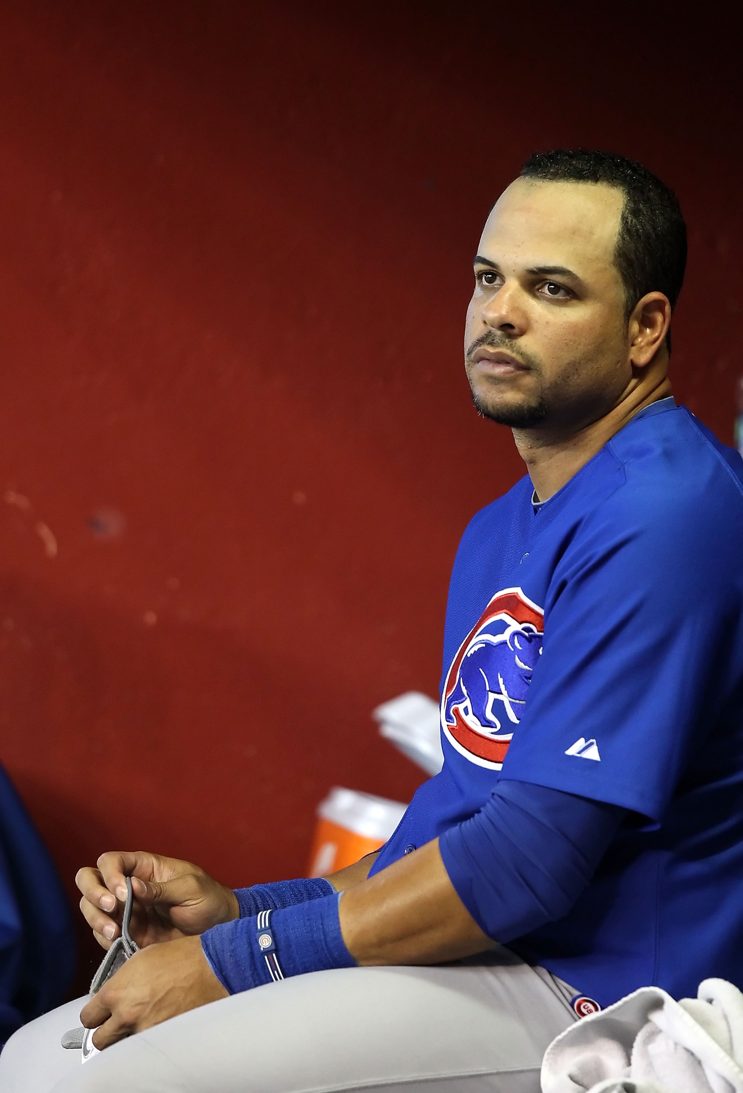 PHOENIX - JULY 05:  Aramis Ramirez #16 of the Chicago Cubs sits in the dugout during the Major League Baseball game against the Arizona Diamondbacks at Chase Field on July 5, 2010 in Phoenix, Arizona.  (Photo by Christian Petersen/Getty Images)