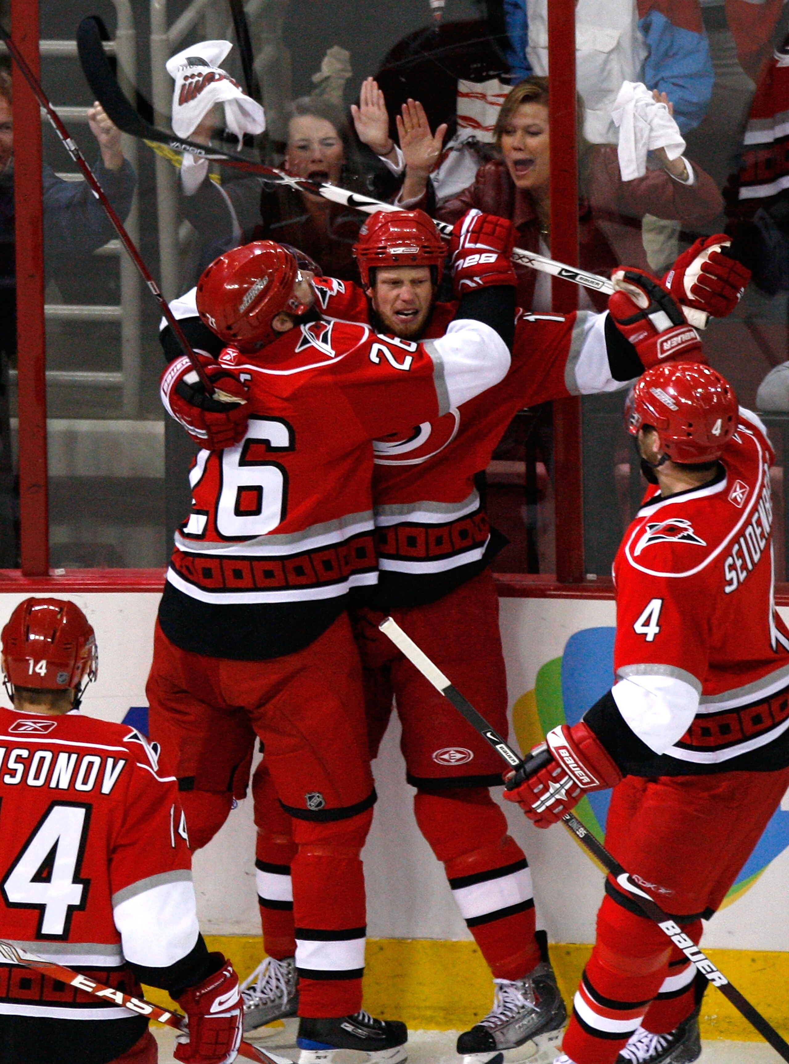 RALEIGH, NC - MAY 26:  Eric Staal #12 of the Carolina Hurricanes reacts after scoring a goal against the Pittsburgh Penguins with Sergei Samsonov #14, Erik Cole #26, and Dennis Seidenberg #4 during Game Four of the Eastern Conference Championship Round of