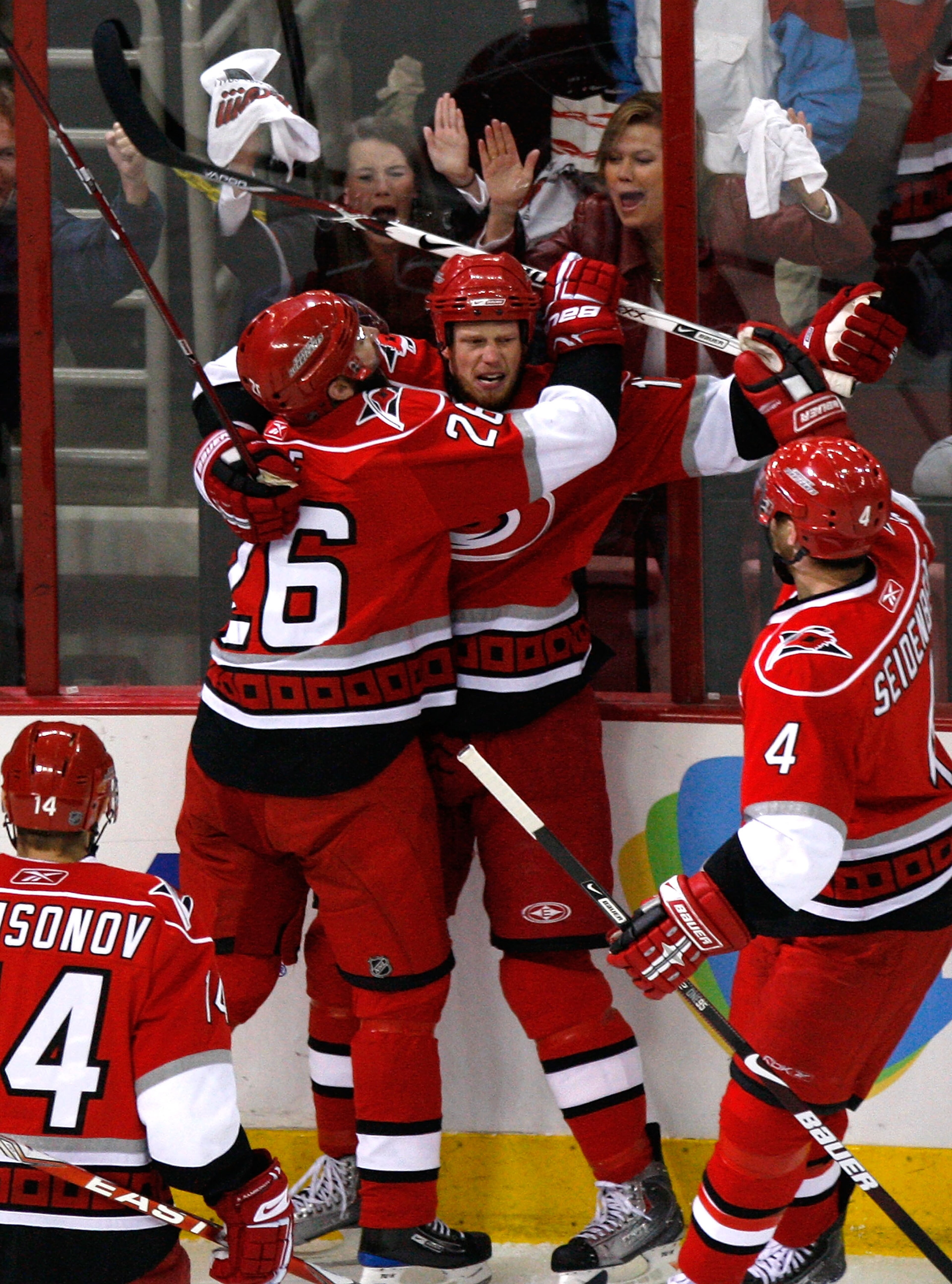 RALEIGH, NC - MAY 26:  Eric Staal #12 of the Carolina Hurricanes reacts after scoring a goal against the Pittsburgh Penguins with Sergei Samsonov #14, Erik Cole #26, and Dennis Seidenberg #4 during Game Four of the Eastern Conference Championship Round of