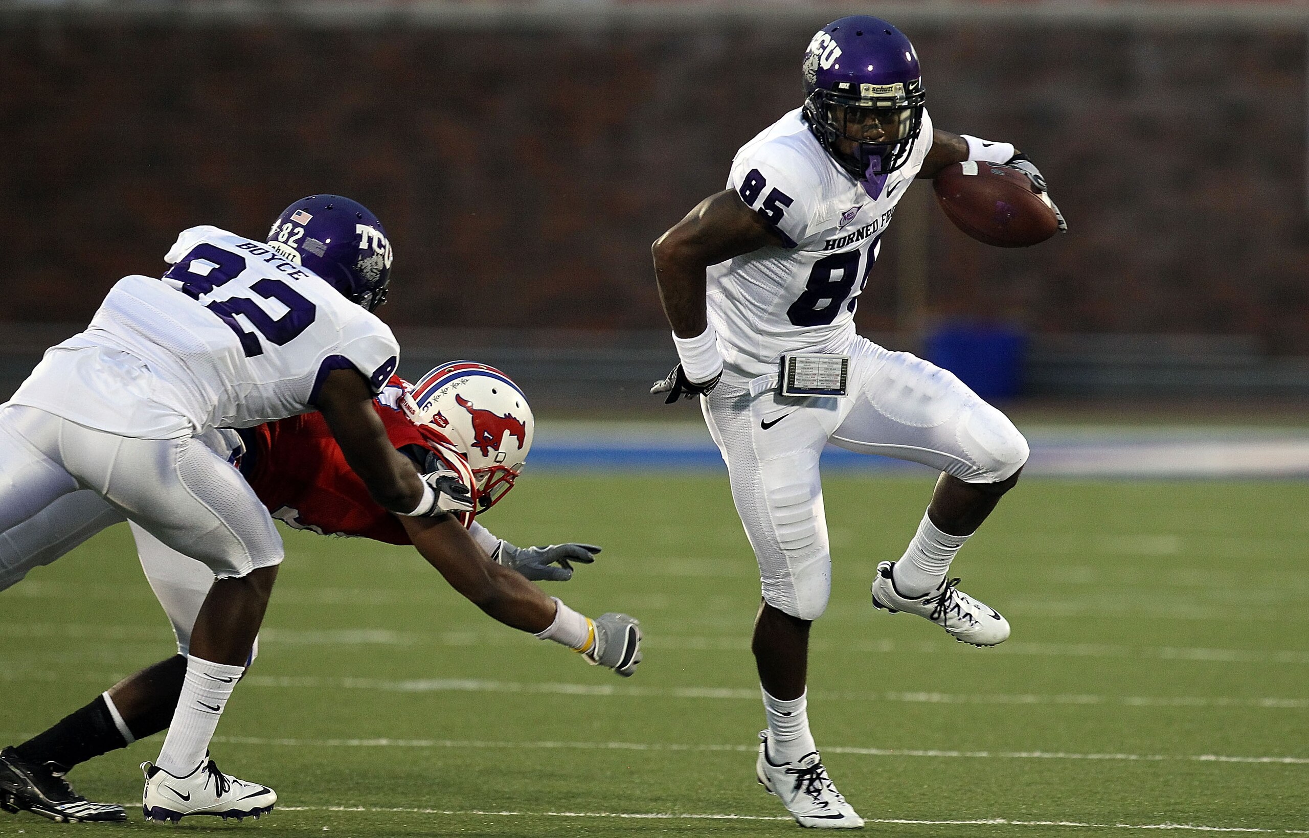 DALLAS - SEPTEMBER 24:  Wide receiver Jeremy Kerley #85 of the TCU Horned Frogs runs the ball against the SMU Mustangs at Gerald J. Ford Stadium on September 24, 2010 in Dallas, Texas.  (Photo by Ronald Martinez/Getty Images)