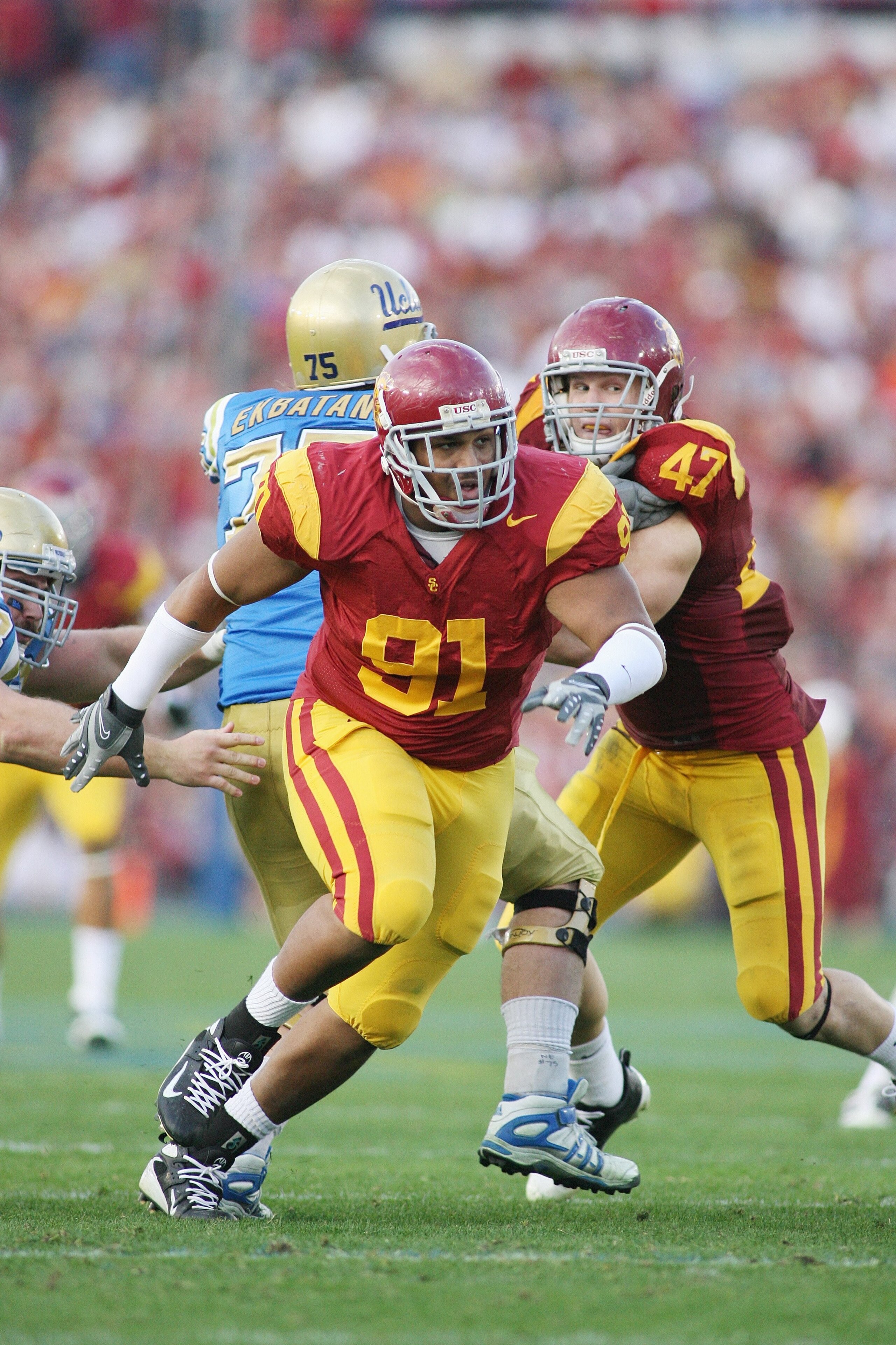 PASADENA, CA - DECEMBER 6:  Jurrell Casey #91 of the USC Trojans rushes against the UCLA Bruins on December 6, 2008 at the Rose Bowl in Pasadena, California.  USC won 28-7.  (Photo by Jeff Golden/Getty Images)