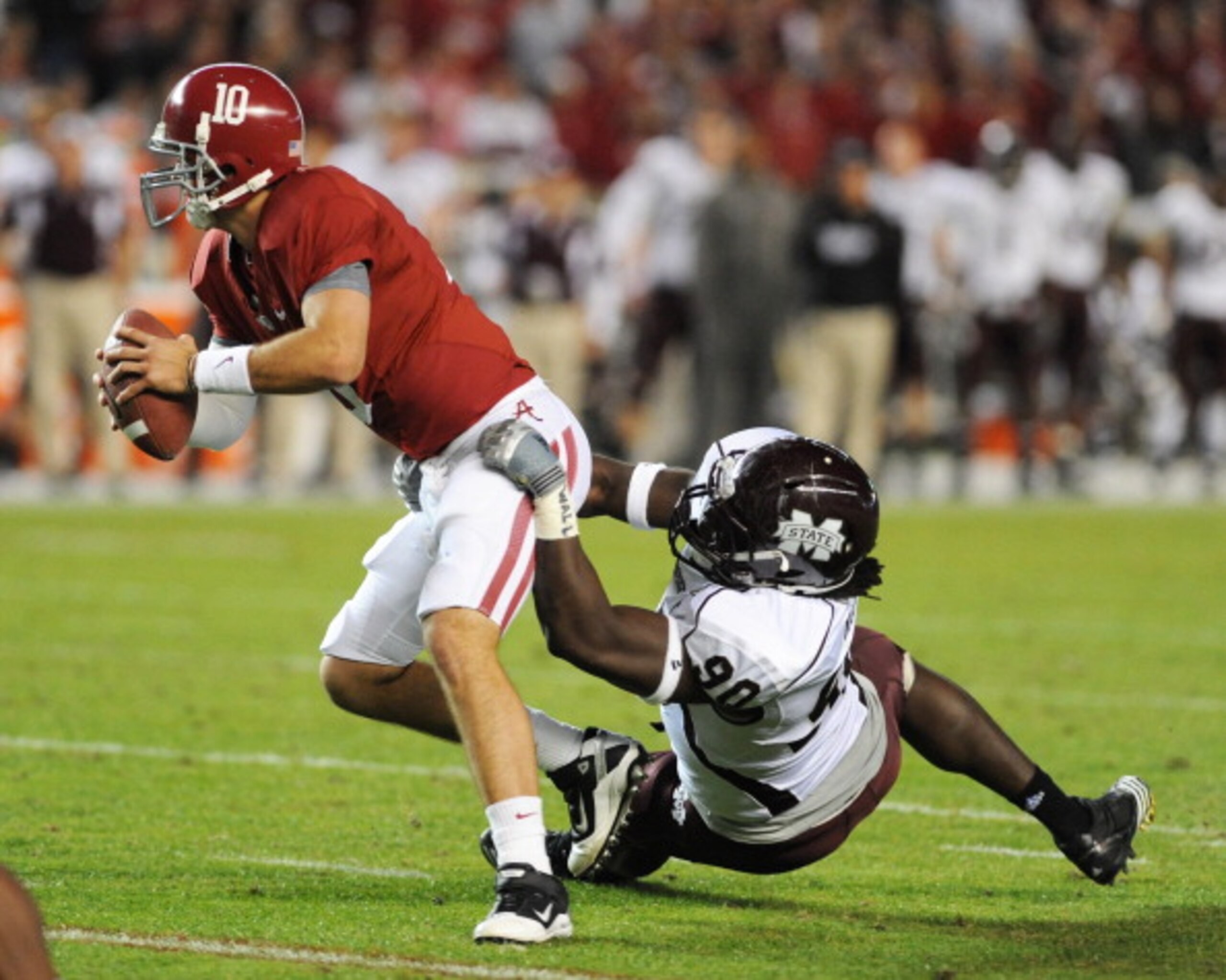 TUSCALOOSA, AL - NOVEMBER 13: Defensive lineman Pernell McPhee #90 of the Mississippi State Bulldogs sacks quarterback A. J. McCarron #10 of the Alabama Crimson Tide November 13, 2010 at Bryant-Denny Stadium in Tuscaloosa, Alabama.  (Photo by Al Messersch