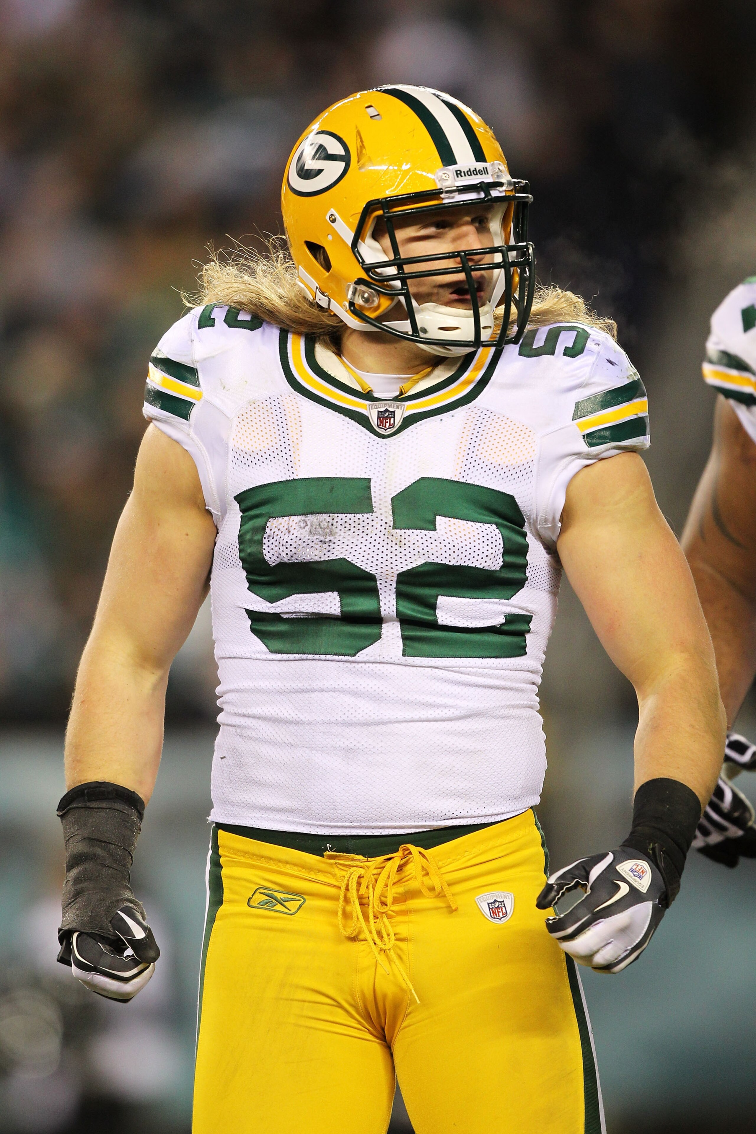 PHILADELPHIA, PA - JANUARY 09:  Clay Matthews #52 of the Green Bay Packers celebrates after a sack against Michael Vick #7 of the Philadelphia Eagles during the 2011 NFC wild card playoff game at Lincoln Financial Field on January 9, 2011 in Philadelphia,