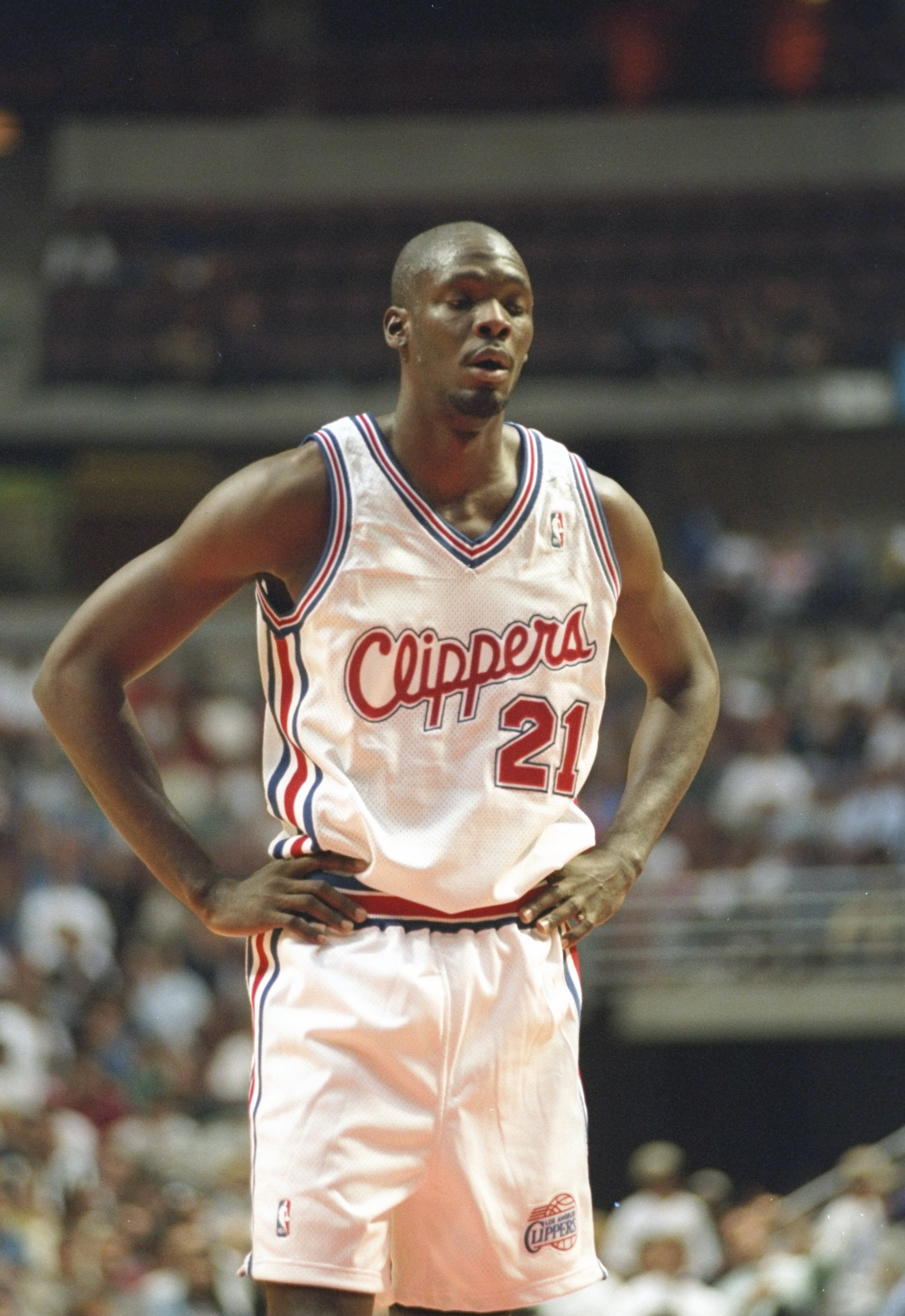 19 Oct 1994:  Guard Malik Sealy of the Los Angeles Clippers stands on the court during a preseason game against the Los Angeles Lakers at Arrowhead Pond in Anaheim, California.  The Lakers won the game 120-104. Mandatory Credit: Stephen Dunn  /Allsport