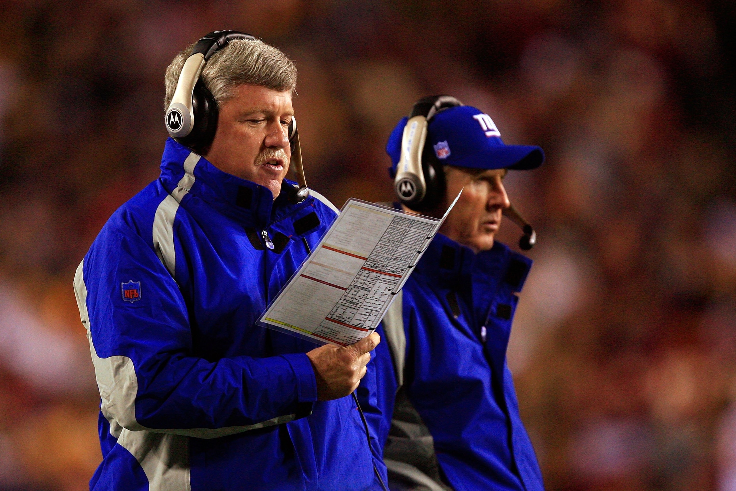 LANDOVER, MD - DECEMBER 30: Quarterbacks coach Kevin Gilbride (L) and head coach Tom Coughlin of the New York Giants look on from the sidelines against the Washington Redskins at FedEx Field on December 30, 2006 in Landover, Maryland. (Photo by Jamie Sq LANDOVER, MD - DECEMBER 30: Quarterbacks coach Kevin Gilbride (L) and head coach Tom Coughlin of the New York Giants look on from the sidelines against the Washington Redskins at FedEx Field on December 30, 2006 in Landover, Maryland. (Photo by Jamie Sq