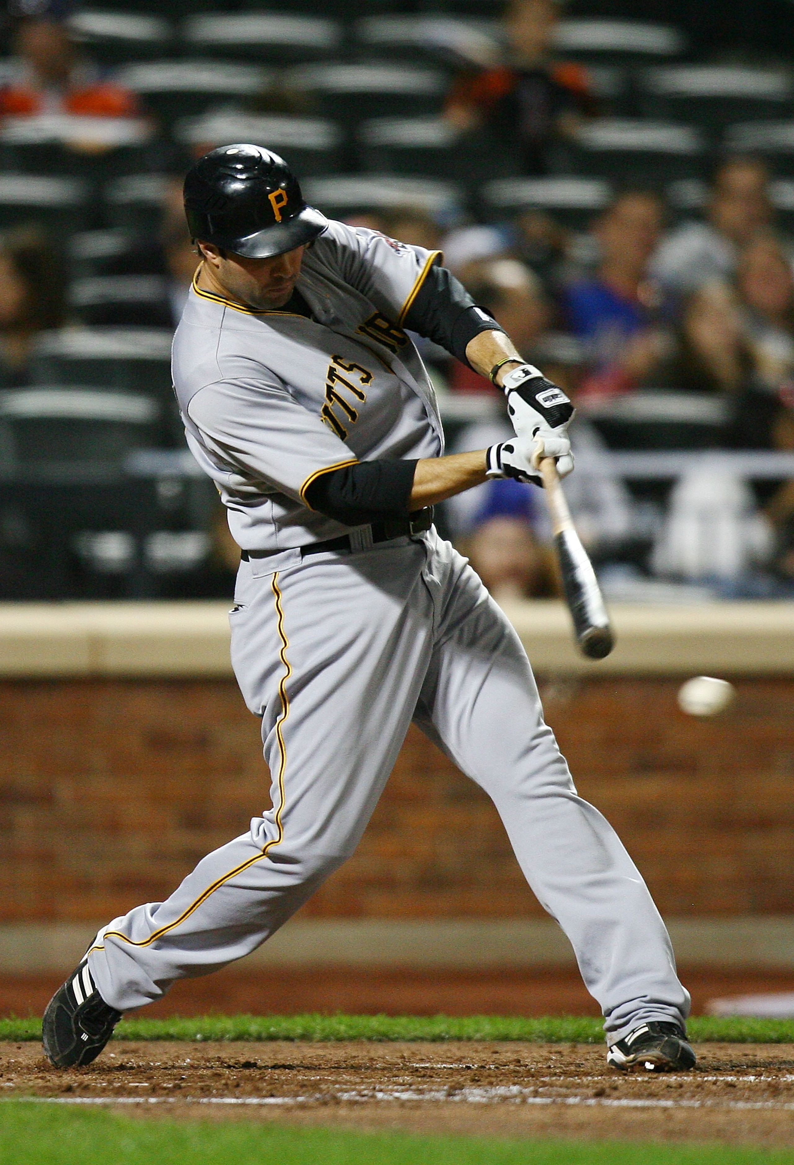 NEW YORK - SEPTEMBER 14:  Neil Walker #18 of the Pittsburgh Pirates bats against the New York Mets on September 14, 2010 at Citi Field in the Flushing neighborhood of the Queens borough of New York City.  (Photo by Andrew Burton/Getty Images)