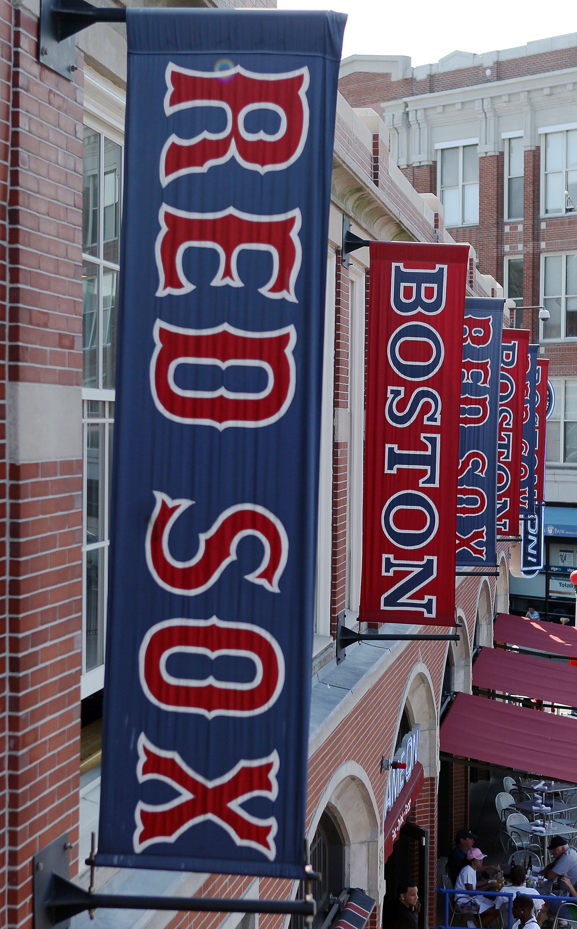BOSTON - AUGUST 01:  Banners line the outside of the stadium as the Boston Red Sox take on the Detroit Tigers on August 1, 2010 at Fenway Park in Boston, Massachusetts. The Red Sox defeated the Tigers 4-3.  (Photo by Elsa/Getty Images)