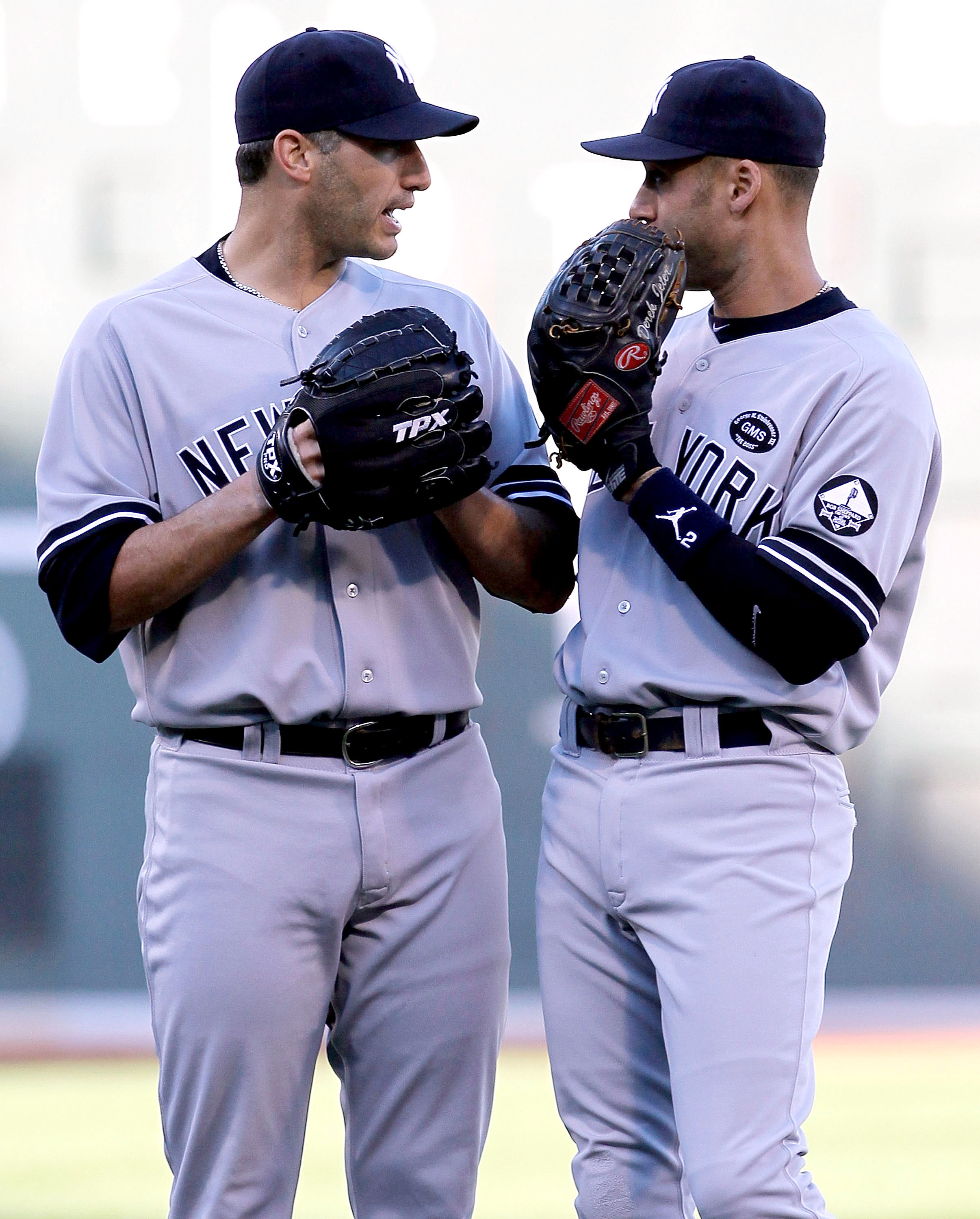 BOSTON - OCTOBER 2:  Andy Pettitte #46 of the New York Yankees has words with teammate Derek Jeter #2 after a run scored in the first inning during the first game of a doubleheader against the Boston Red Sox at Fenway Park October 2, 2010 in Boston, Massa