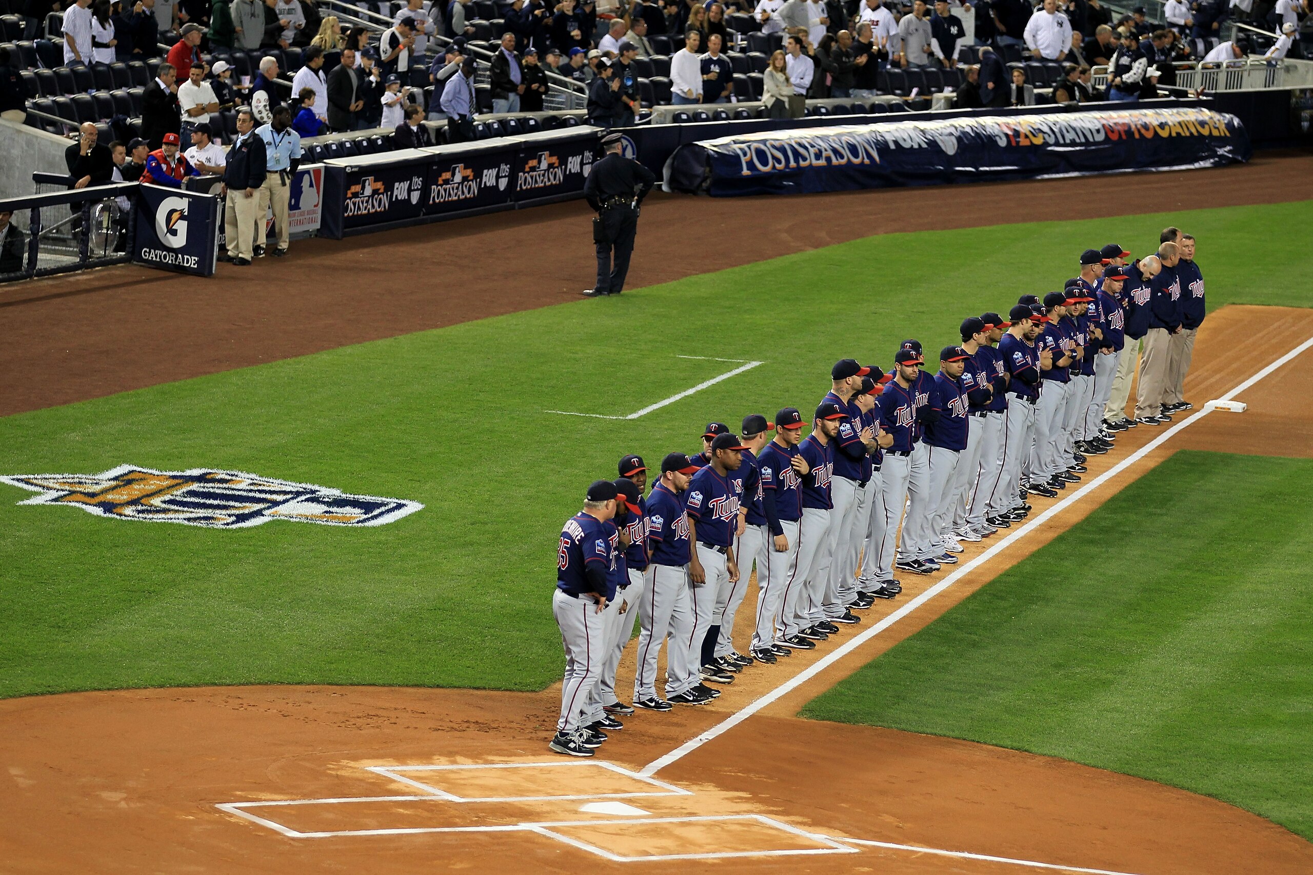 NEW YORK - OCTOBER 09:  The Minnesota Twins line up on the foul line during player introductions against the New York Yankees  during Game Three of the ALDS part of the 2010 MLB Playoffs at Yankee Stadium on October 9, 2010 in the Bronx borough of New Yor