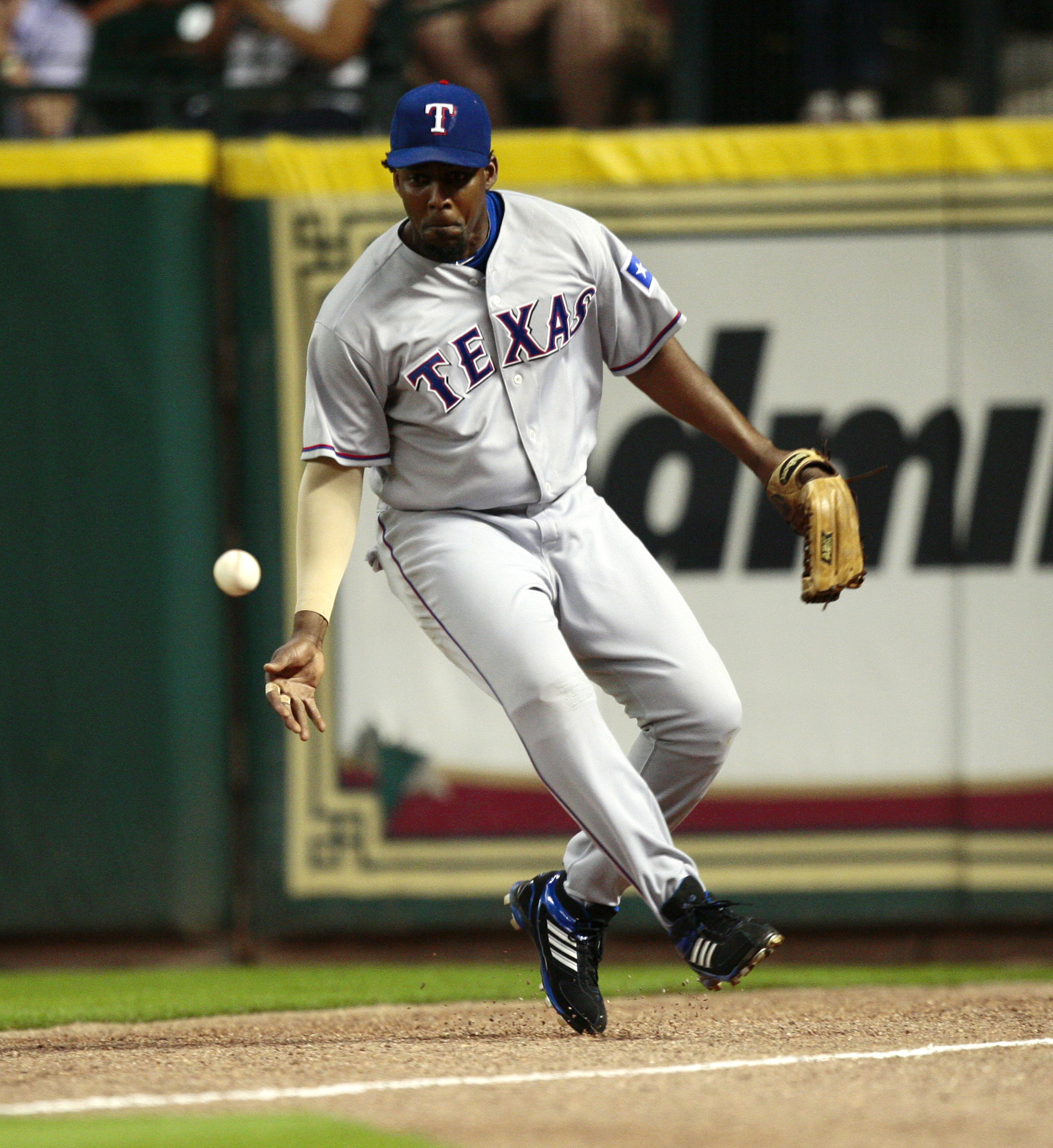 HOUSTON - JUNE 18:  Right fielder Vladimir Guerrero #27 of the Texas Rangers fields a ball hit by Hunter Pence of the Houston Astros during the fourth inning at Minute Maid Park on June 18, 2010 in Houston, Texas.  (Photo by Bob Levey/Getty Images)