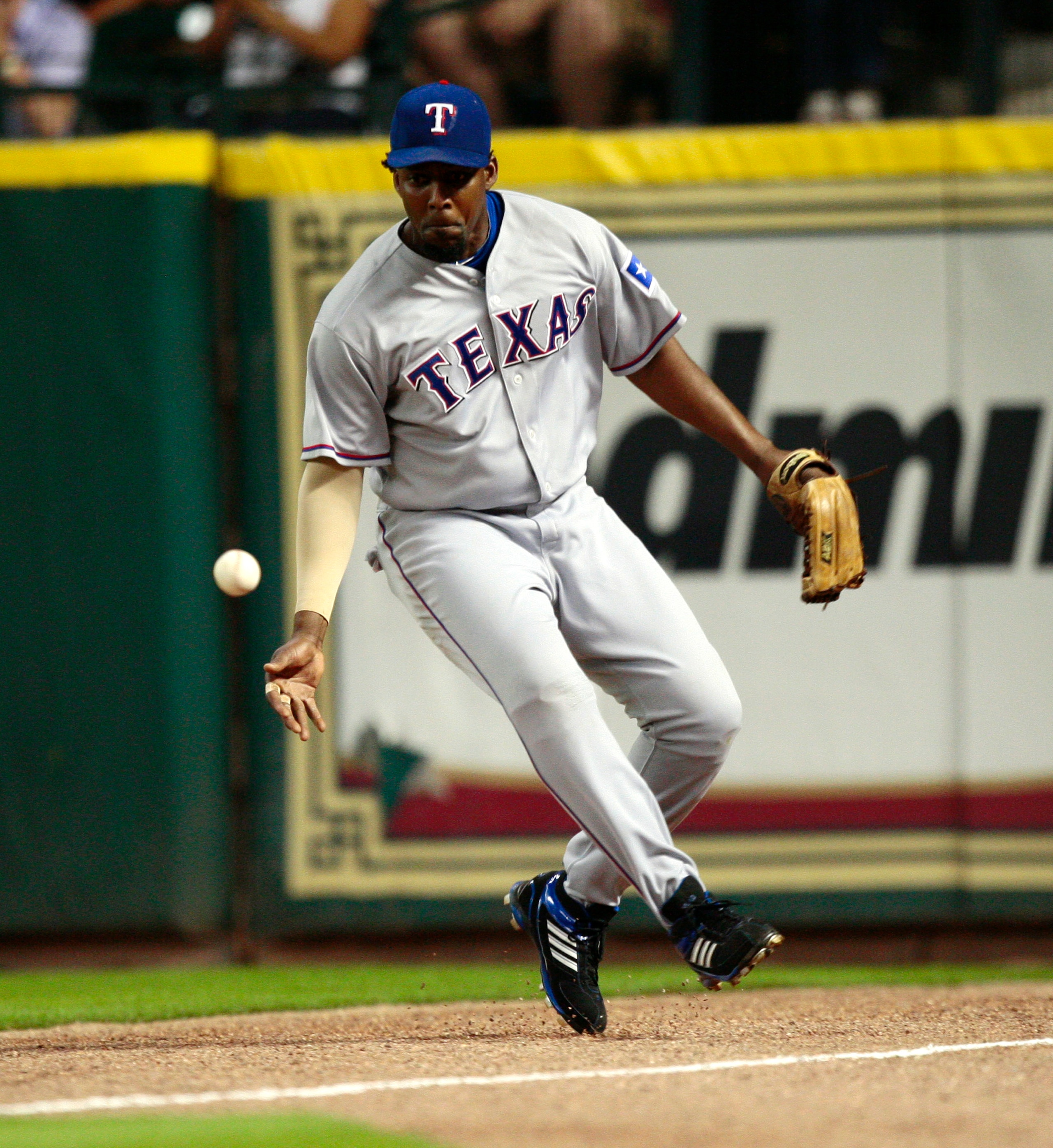 HOUSTON - JUNE 18:  Right fielder Vladimir Guerrero #27 of the Texas Rangers fields a ball hit by Hunter Pence of the Houston Astros during the fourth inning at Minute Maid Park on June 18, 2010 in Houston, Texas.  (Photo by Bob Levey/Getty Images)