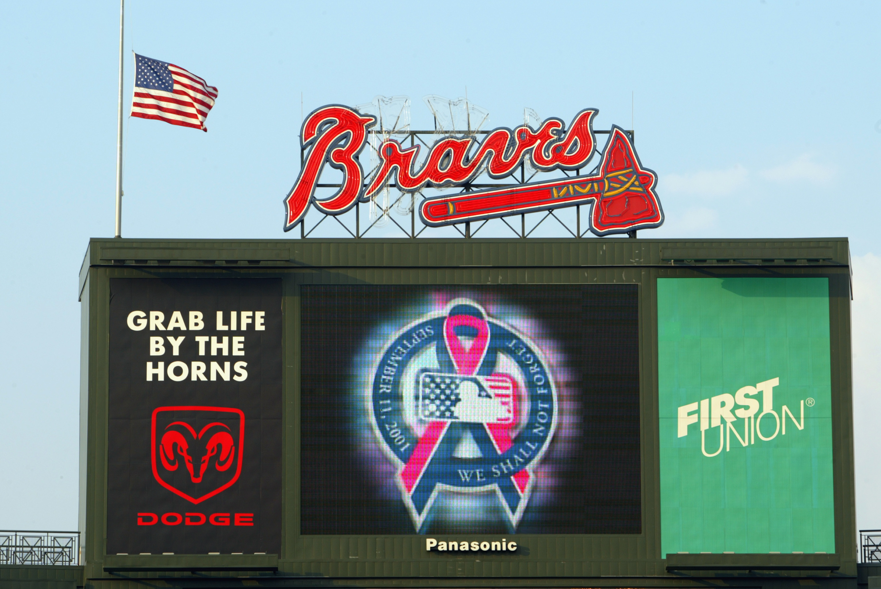 ATLANTA - SEPTEMBER 11:  Detail of the commemorative logo on the jumbotron honoring the victims of the 9-11-01 terror attacks before the second game of a MLB double-header between the Atlanta Braves and the New York Mets on September 11, 2002 at Turner Fi