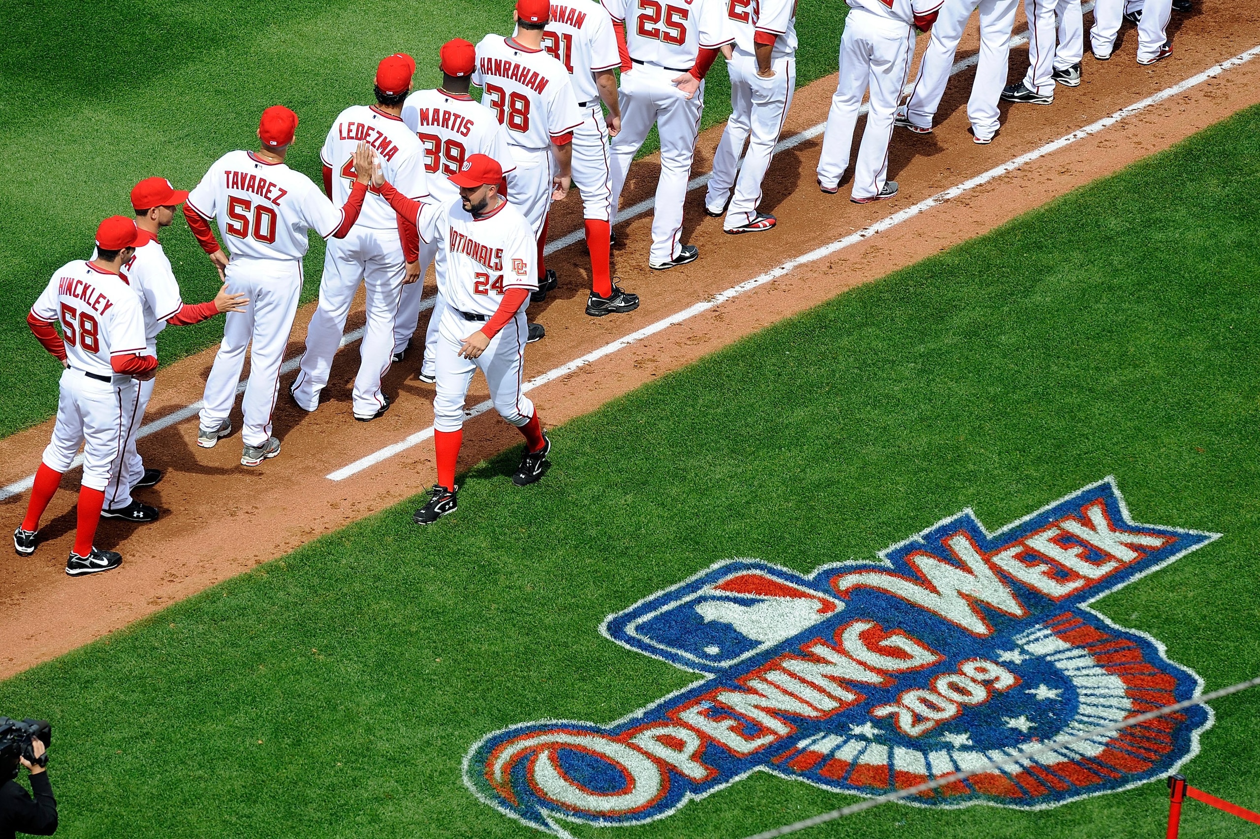 WASHINGTON - APRIL 13:  Nick Johnson #24 of the Washington Nationals is introduced before the home opener against the Philadelphia Phillies at Nationals Park on April 13, 2009 in Washington, DC.  (Photo by Greg Fiume/Getty Images)