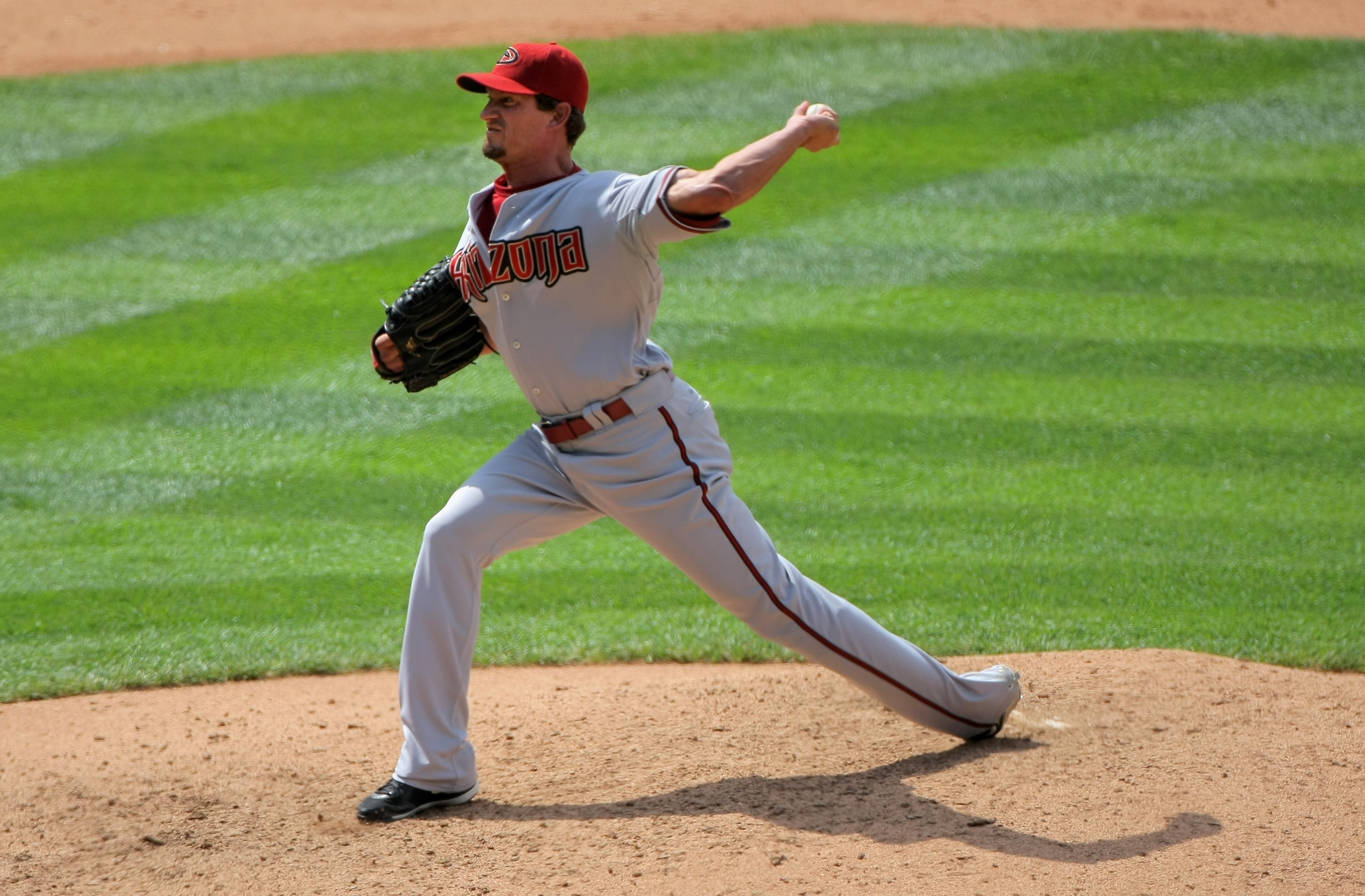 DENVER - JULY 22:  Relief pitcher Scott Schoeneweis  #60 of the Arizona Diamondbacks delivers against the Colorado Rockies during MLB action at Coors Field on July 22, 2009 in Denver, Colorado. Schoenweis collected the loss as the Rockies defeated the Dia