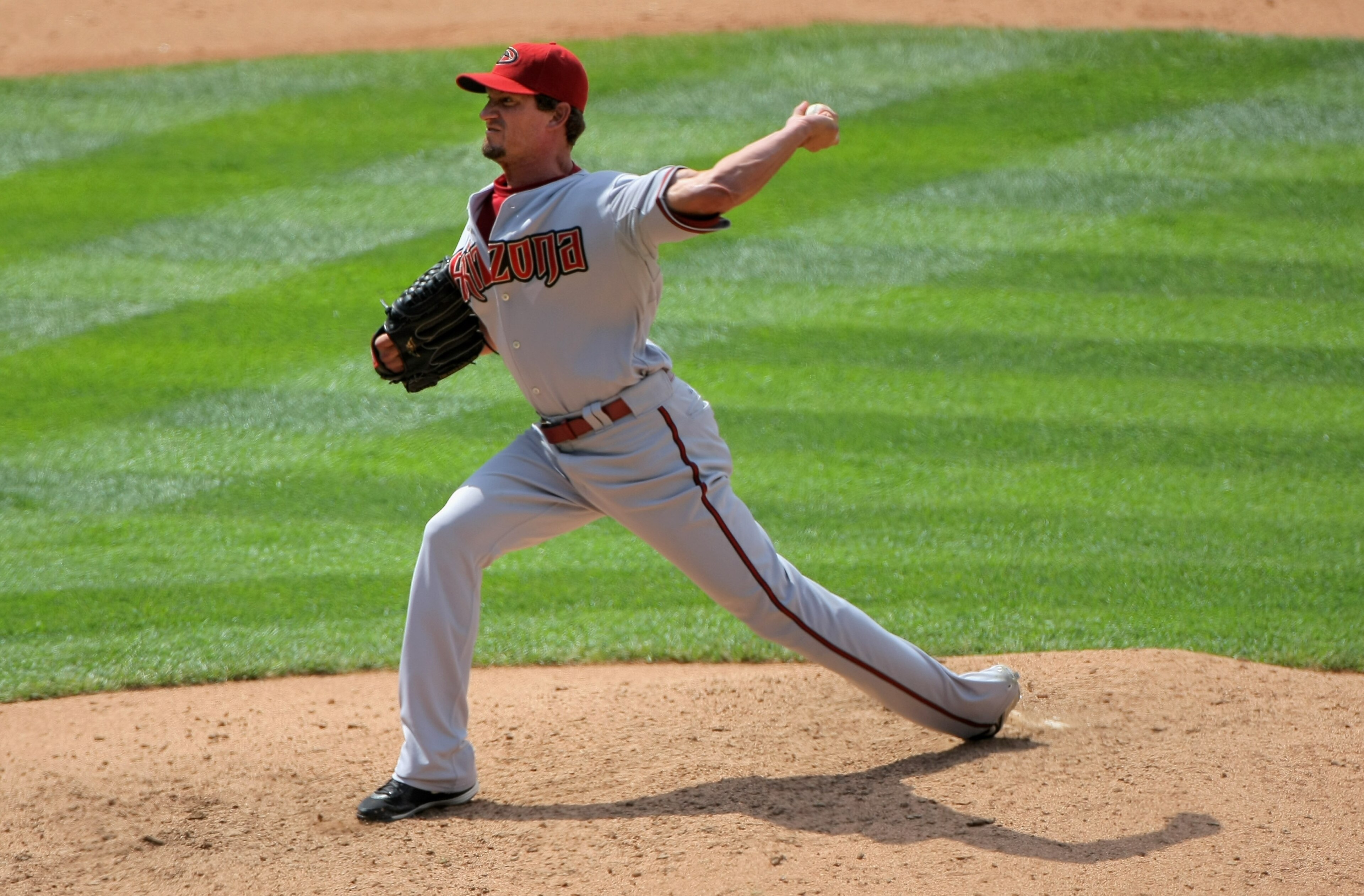 DENVER - JULY 22:  Relief pitcher Scott Schoeneweis  #60 of the Arizona Diamondbacks delivers against the Colorado Rockies during MLB action at Coors Field on July 22, 2009 in Denver, Colorado. Schoenweis collected the loss as the Rockies defeated the Dia