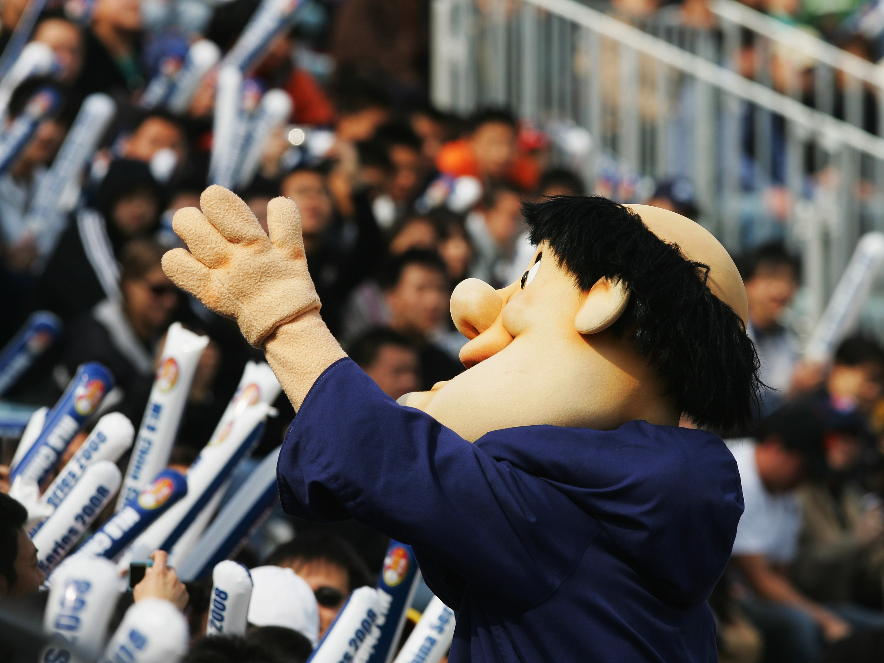 BEIJING - MARCH 16:  Swinging Friar, the San Diego Padres mascot, waves to crowd during the second game between the Los Angeles Dodgers and the San Diego Padres at Beijing's Wukesong Stadium on March 16, 2008 in Beijing, China. The Padres played against t