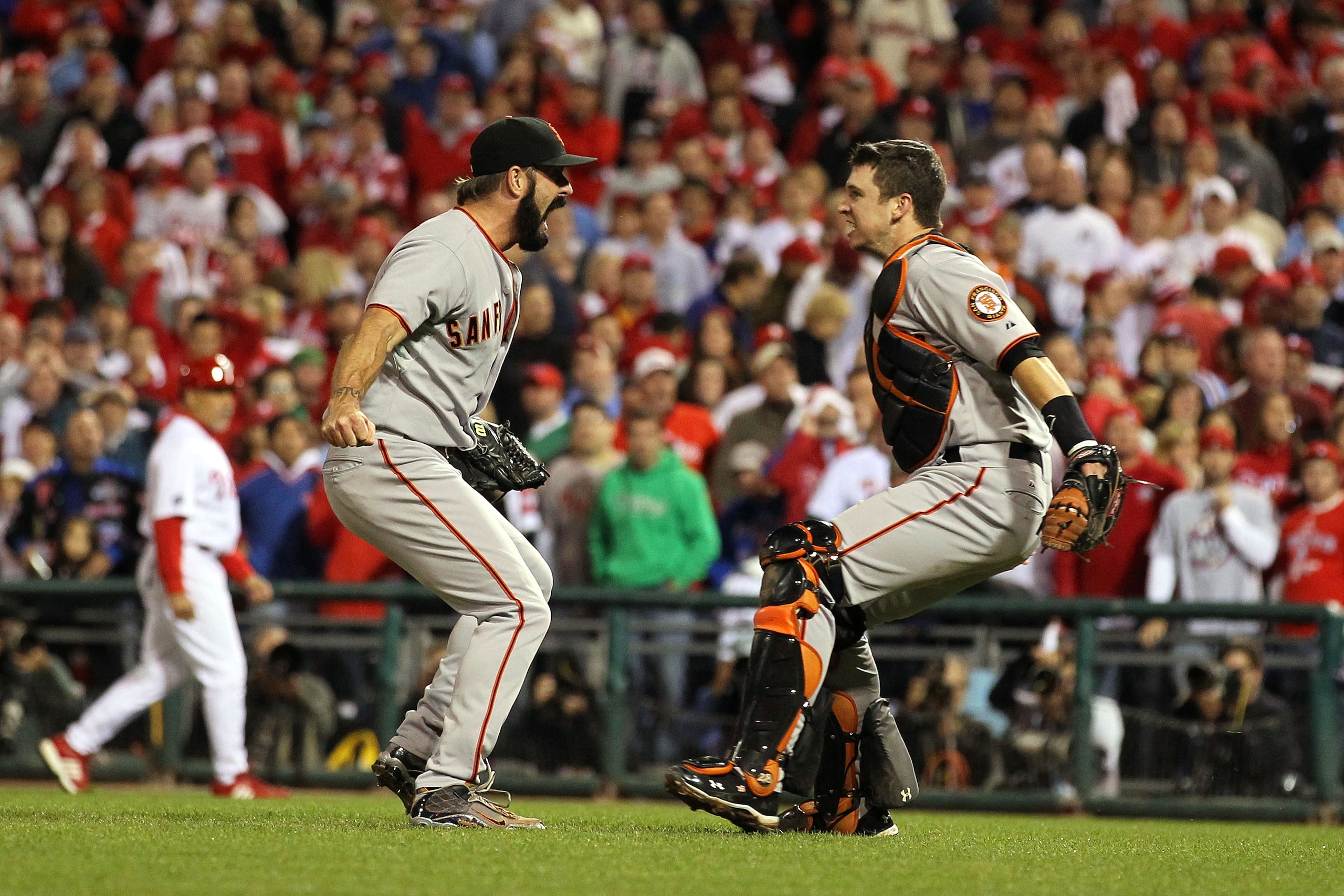 PHILADELPHIA - OCTOBER 23:  Buster Posey #28 and Brian Wilson #38 of the San Francisco Giants celebrate defeating the Philadelphia Phillies 3-2 and winning the pennant in Game Six of the NLCS during the 2010 MLB Playoffs at Citizens Bank Park on October 2