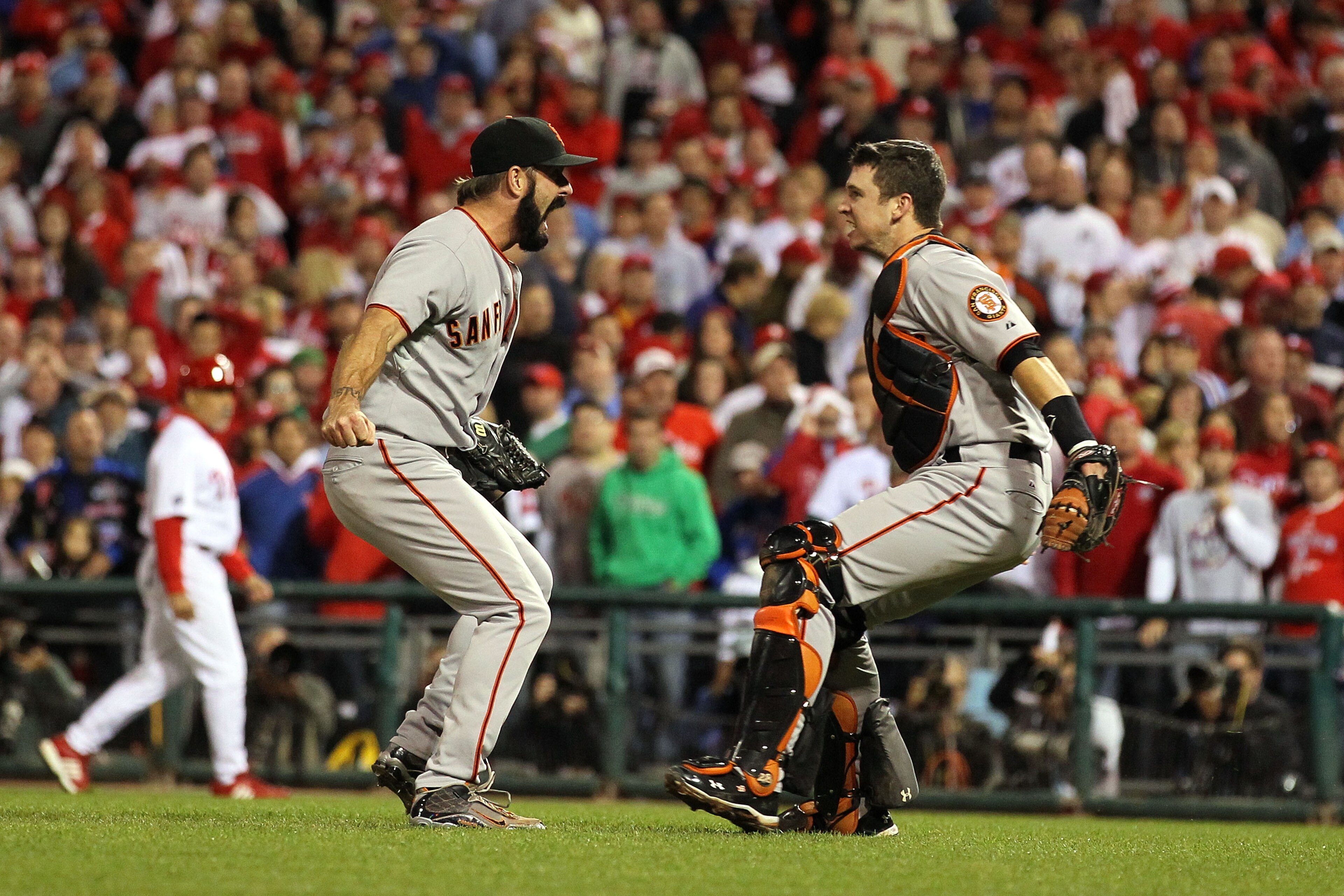 PHILADELPHIA - OCTOBER 23:  Buster Posey #28 and Brian Wilson #38 of the San Francisco Giants celebrate defeating the Philadelphia Phillies 3-2 and winning the pennant in Game Six of the NLCS during the 2010 MLB Playoffs at Citizens Bank Park on October 2