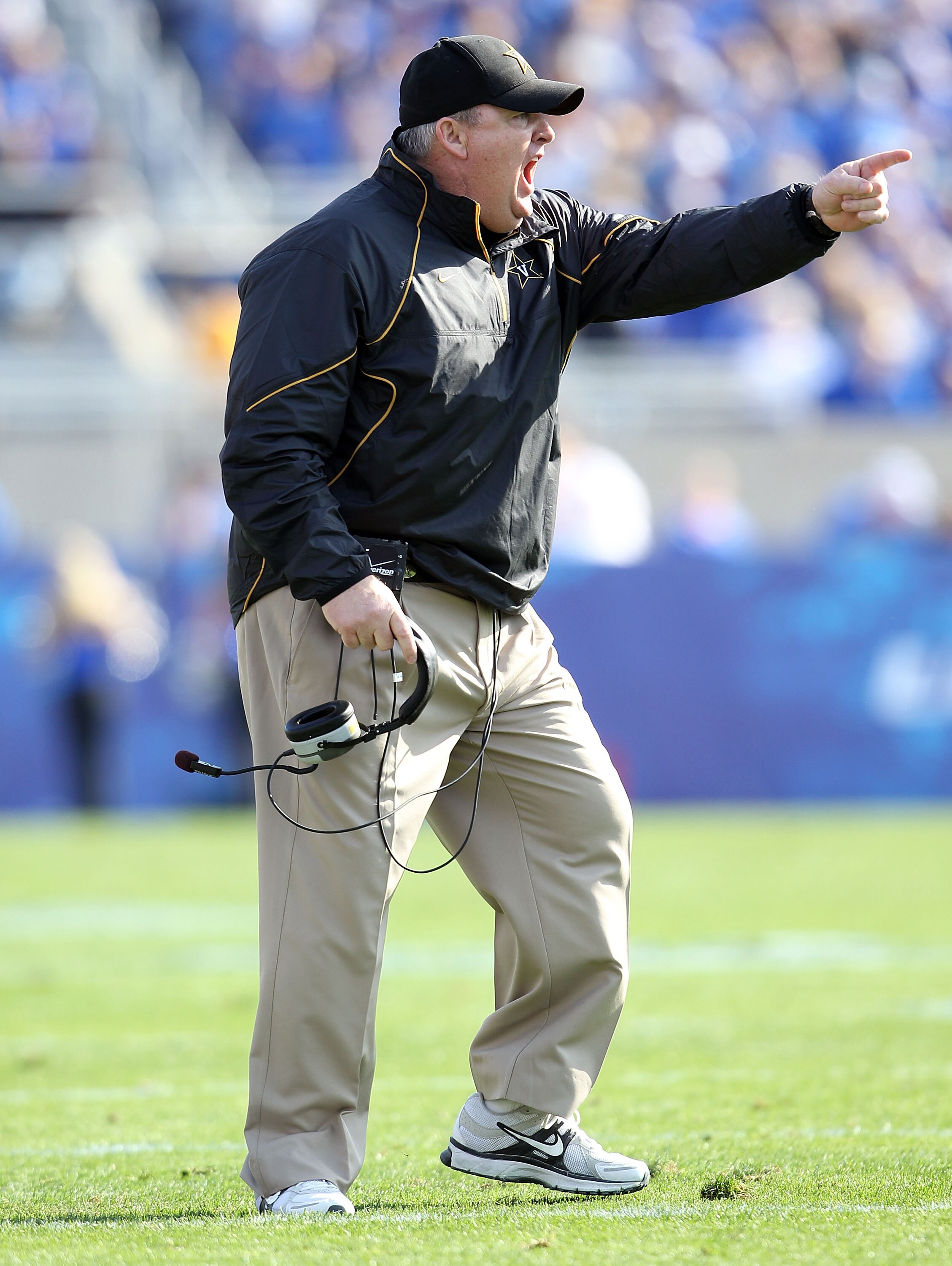LEXINGTON, KY - NOVEMBER 13: Robbie Caldwell  the Head Coach of the Vanderbilt Commodores gives instructions to his team during the game against the Kentucky Wildcats  at Commonwealth Stadium on November 13, 2010 in Lexington, Kentucky.  (Photo by Andy Ly