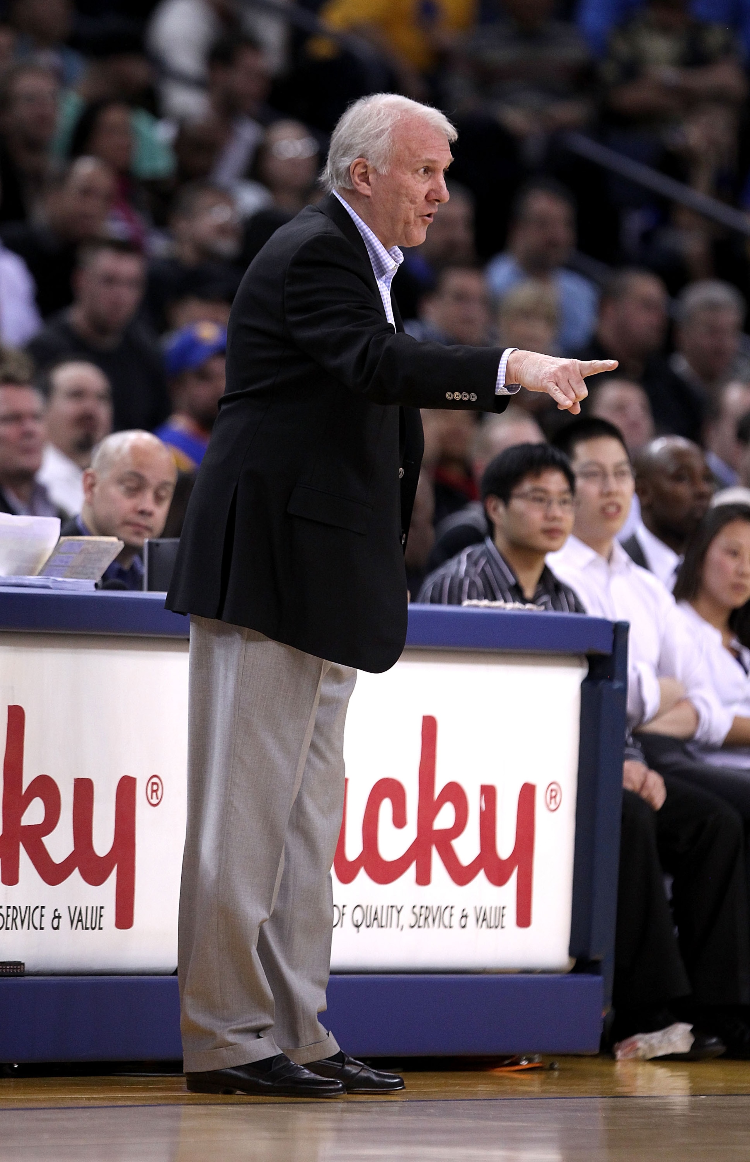 OAKLAND, CA - JANUARY 24:  Gregg Popovich of the San Antonio Spurs walks the sideline during their game against the Golden State Warriors at Oracle Arena on January 24, 2011 in Oakland, California.  NOTE TO USER: User expressly acknowledges and agrees tha