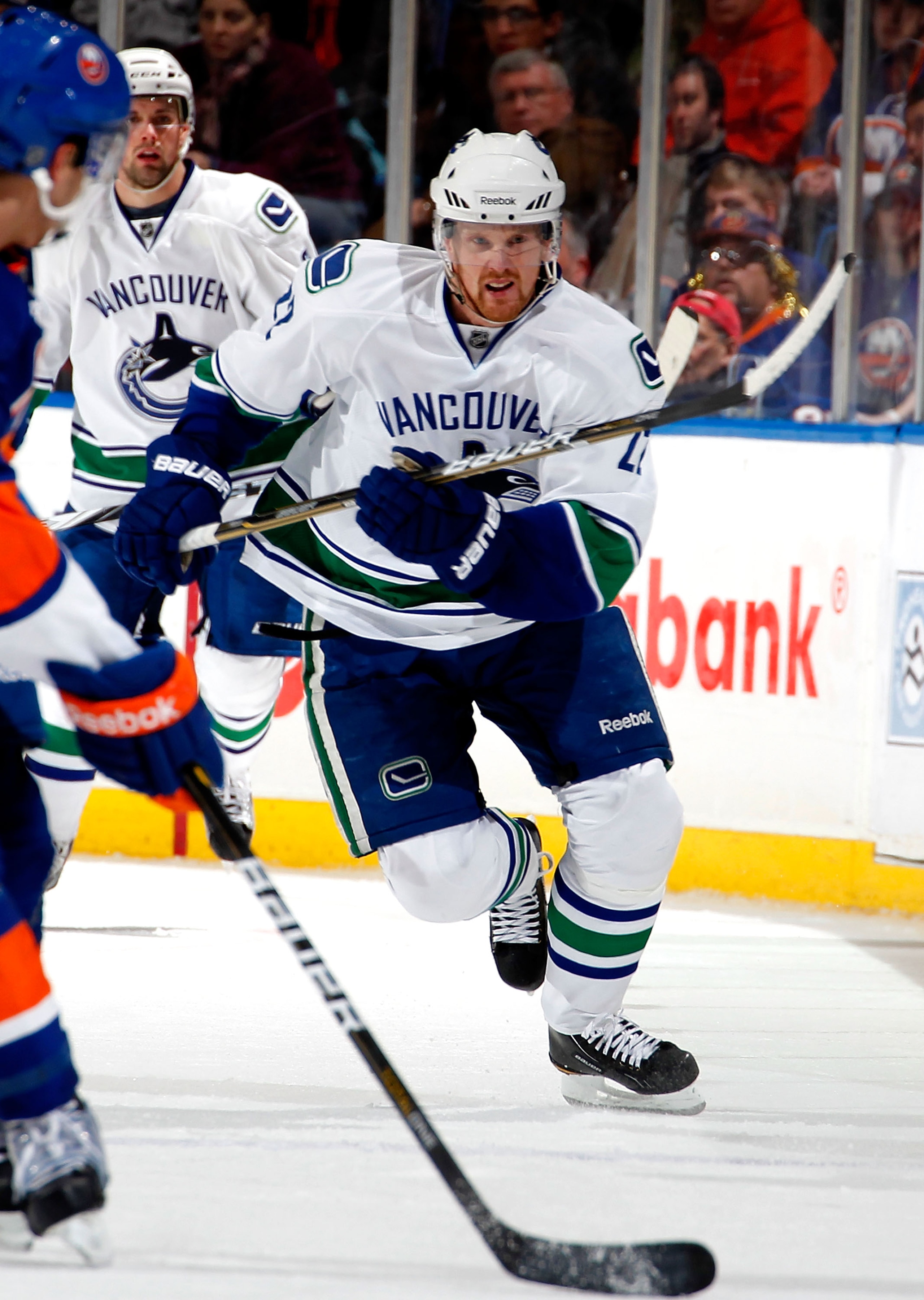 UNIONDALE, NY - JANUARY 11:  Daniel Sedin #22 of the Vancouver Canucks skates during an NHL game against the New York Islanders at Nassau Coliseum on January 11, 2011 in Uniondale, New York.  (Photo by Paul Bereswill/Getty Images)