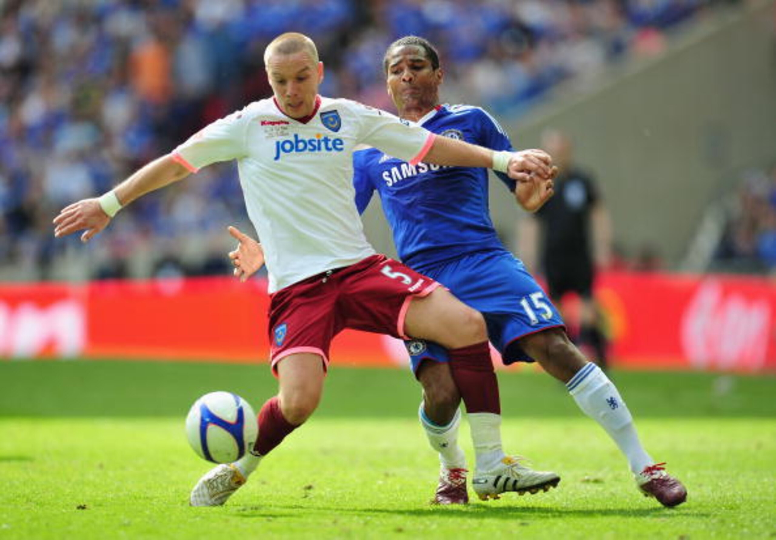 LONDON, ENGLAND - MAY 15:  Jamie O'Hara of Portsmouth tussles for posession with Florent Malouda of Chelsea during the FA Cup sponsored by E.ON Final match between Chelsea and Portsmouth at Wembley Stadium on May 15, 2010 in London, England.  (Photo by Cl