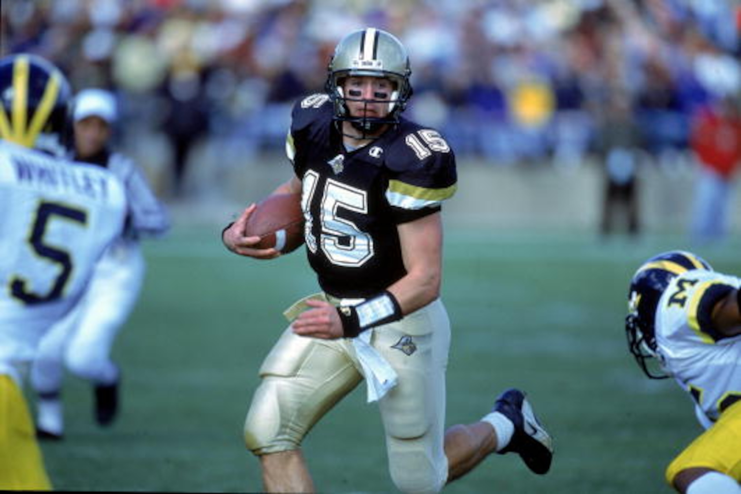 7 Oct 2000: Drew Brees #15 of the Purdue Boilermakers scrambles with the ball during a game against the Michigan Wolverines at the Ross-Ade Stadium in West Lafayette, Indiana.  The Boilermakers defeated the Wolerines 23-22.Mandatory Credit: Jonathan Danie