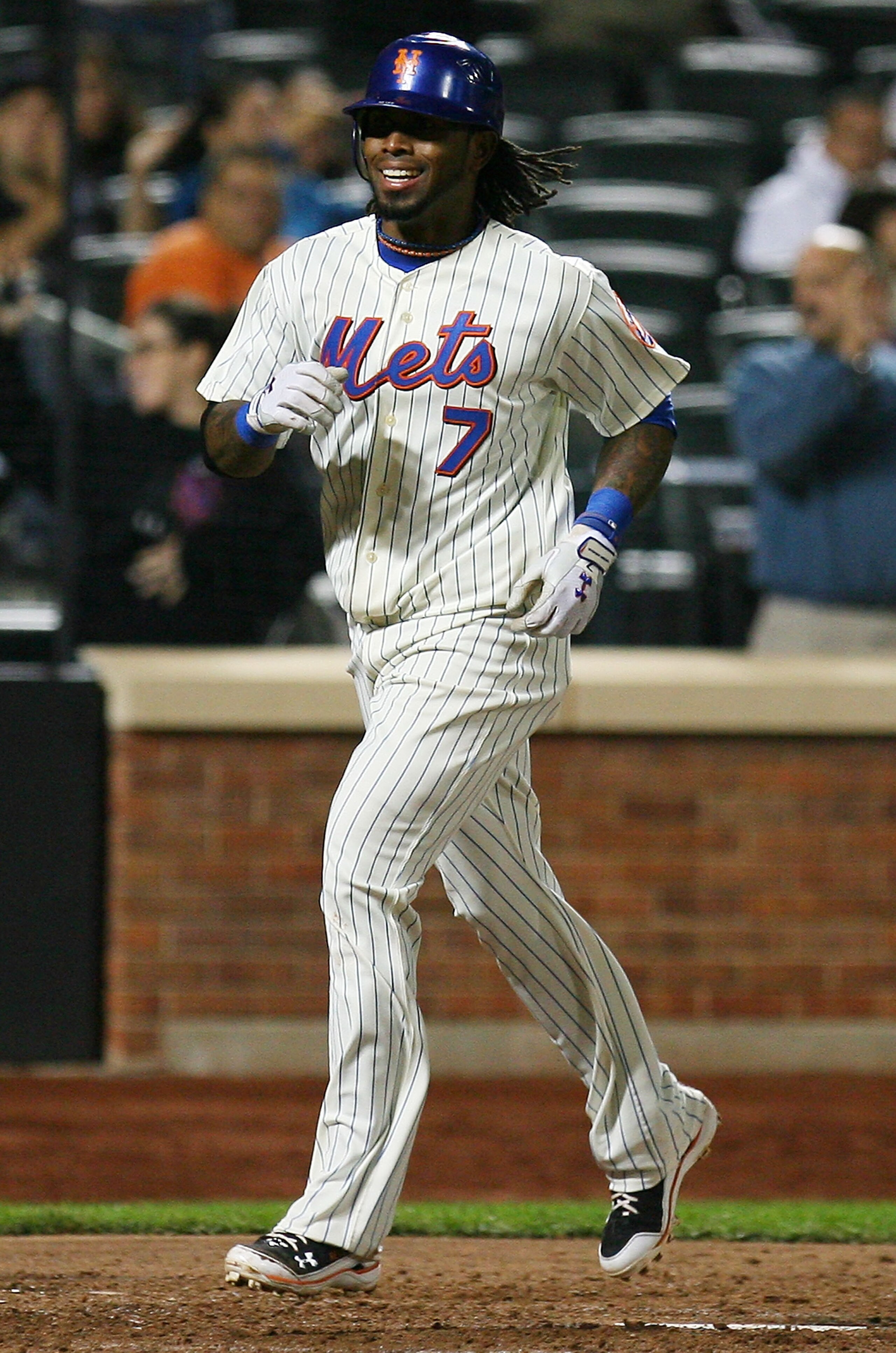 NEW YORK - SEPTEMBER 15:  Jose Reyes #7 of the New York Mets celebrates after hitting a home run in the sixth inning  against the Pittsburgh Pirates on September 15, 2010 at Citi Field in the Flushing neighborhood of the Queens borough of New York City.  