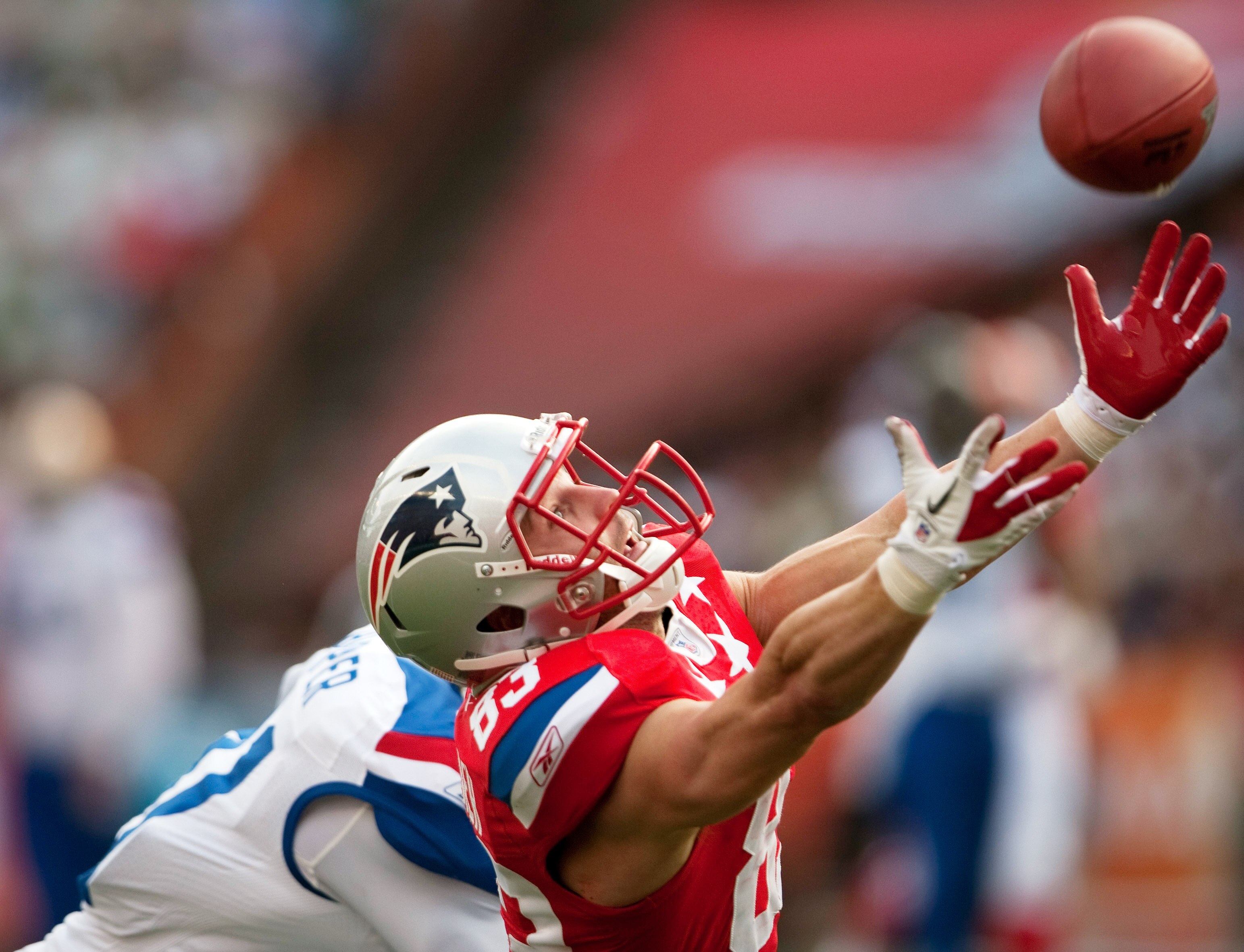 HONOLULU - JANUARY 30:  Wes Welker, #83 of the New England Patriots tries to reel in a pass during the 2011 NFL Pro Bowl at Aloha Stadium on January 30, 2011 in Honolulu, Hawaii. NFC won 55-41 over the AFC. (Photo by Kent Nishimura/Getty Images)