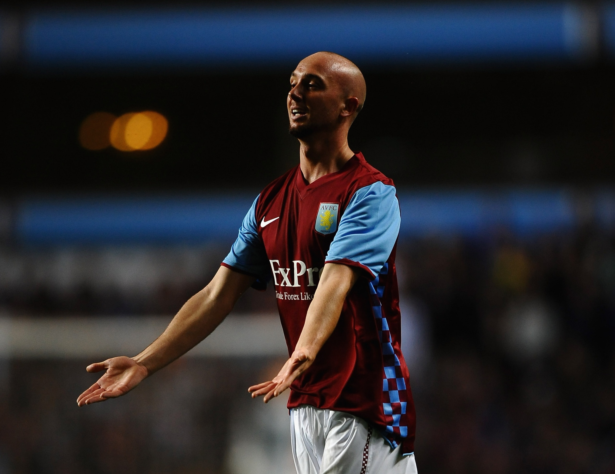 BIRMINGHAM, ENGLAND - AUGUST 26:  Stephen Ireland of Aston Villa shows his frustrations during the UEFA Europa League  Play Off, second leg match between Aston Villa and SK Rapid Vienna at Villa Park on August 26, 2010 in Birmingham, England.  (Photo by L