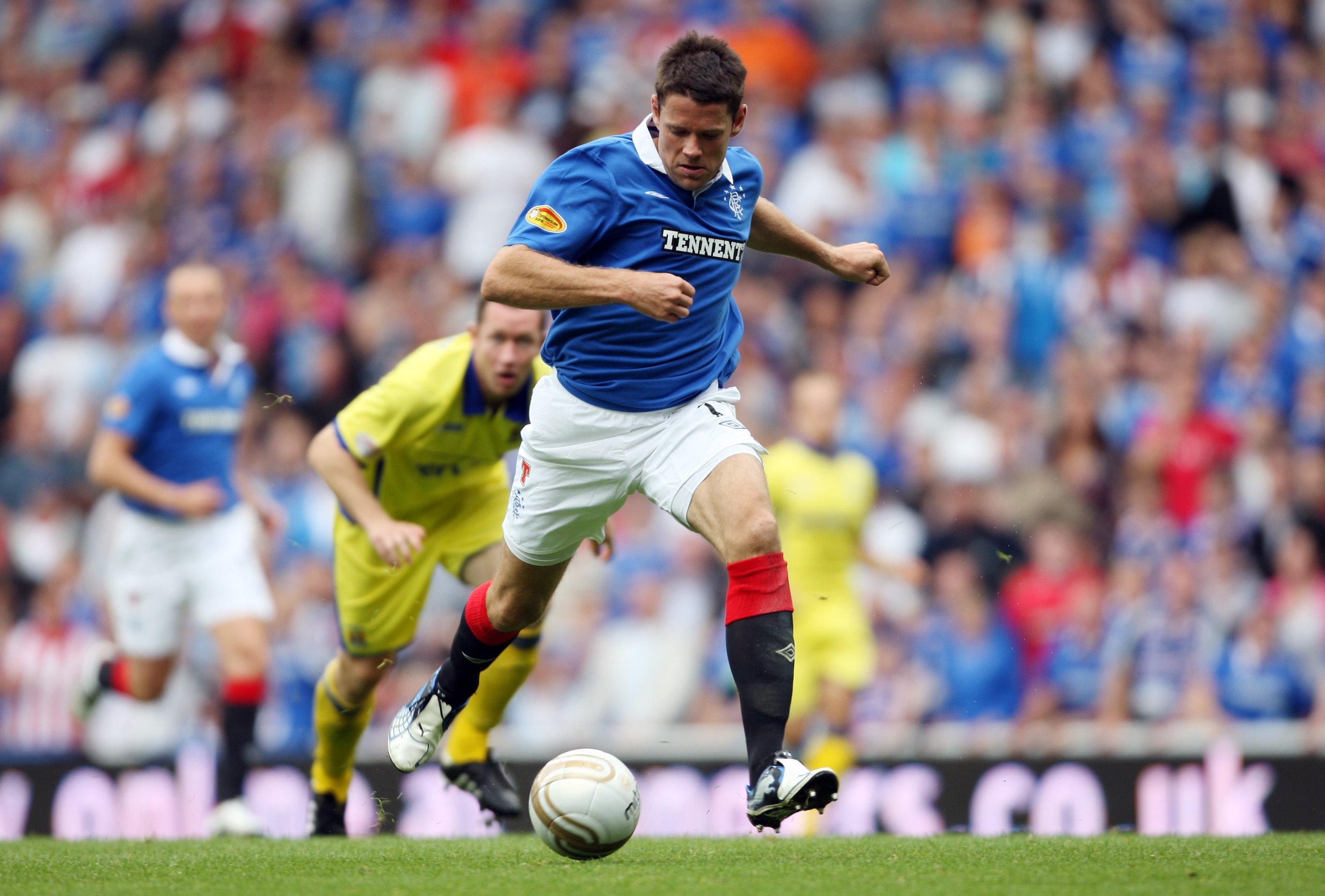 GLASGOW, UNITED KINGDOM - AUGUST 14:  James Beattie of Glasgow Rangers running through on goal during the Clydesdale Bank Scottish Premier League match between Glasgow Rangers and Kilmarnock at Ibrox Stadium on August 14, 2010 in Glasgow, Scotland. (Photo