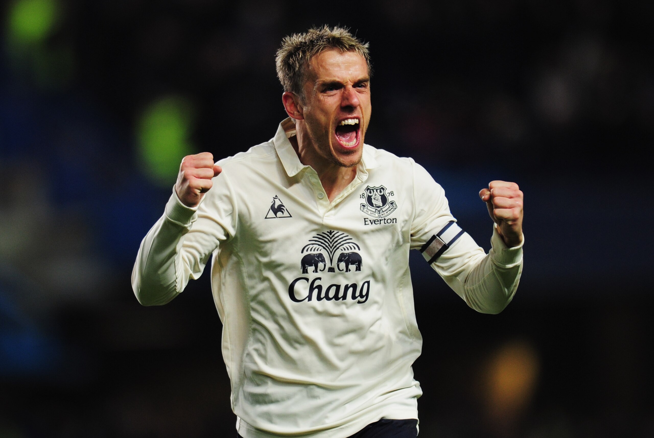 LONDON, ENGLAND - DECEMBER 04:  Phil Neville of Everton celebrates as Jermaine Beckford scores their first goal during the Barclays Premier League match between Chelsea and Everton at Stamford Bridge on December 4, 2010 in London, England.  (Photo by Shau