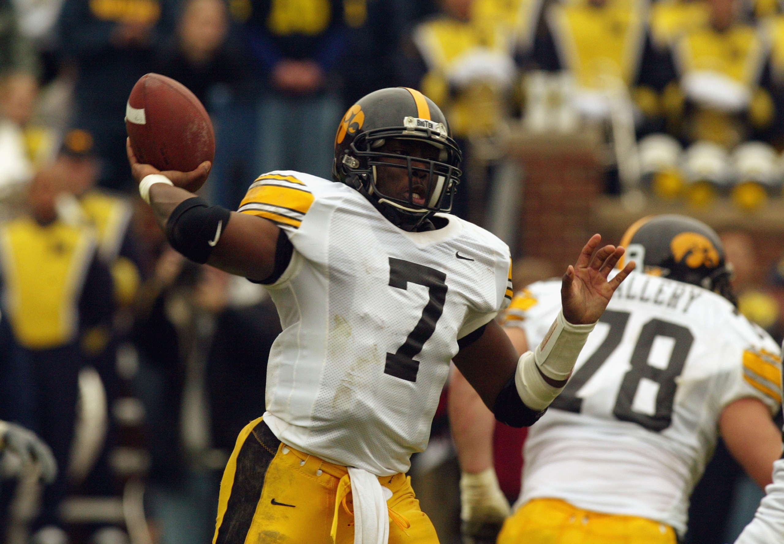 ANN ARBOR, MI - OCTOBER 26:  Quarterback Brad Banks #7 of the Iowa Hawkeyes passes the ball during the NCAA football game against the Michigan Wolverines at Michigan Stadium on October 26, 2002 in Ann Arbor, Michigan.  Banks passed for a total of 222 yard