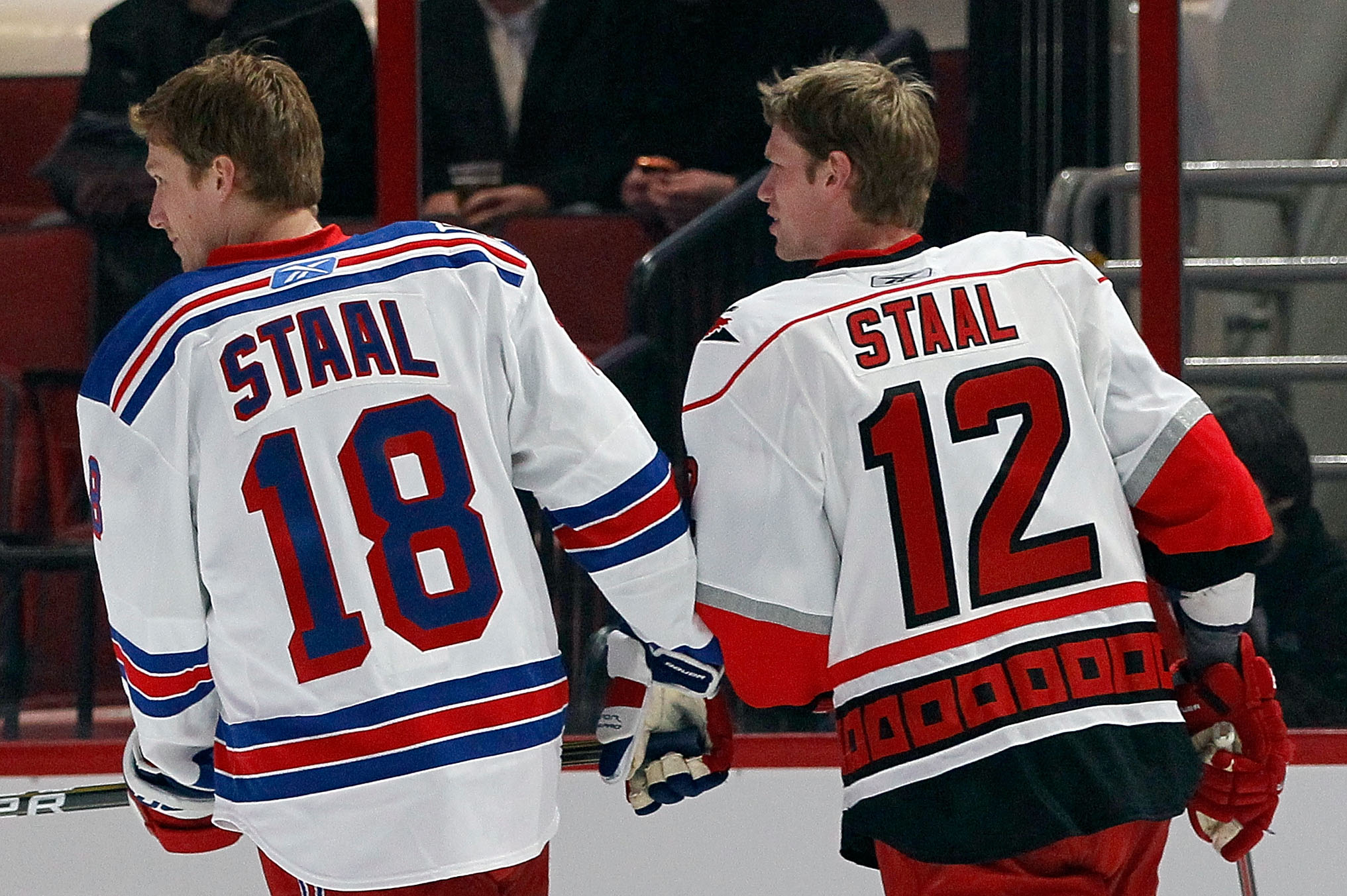 RALEIGH, NC - JANUARY 29:  Marc Staal #18 of the New York Rangers and Eric Staal #12 of the Carolina Hurricanes skate on the ice before the Honda NHL SuperSkills competition part of 2011 NHL All-Star Weekend at the RBC Center on January 29, 2011 in Raleig