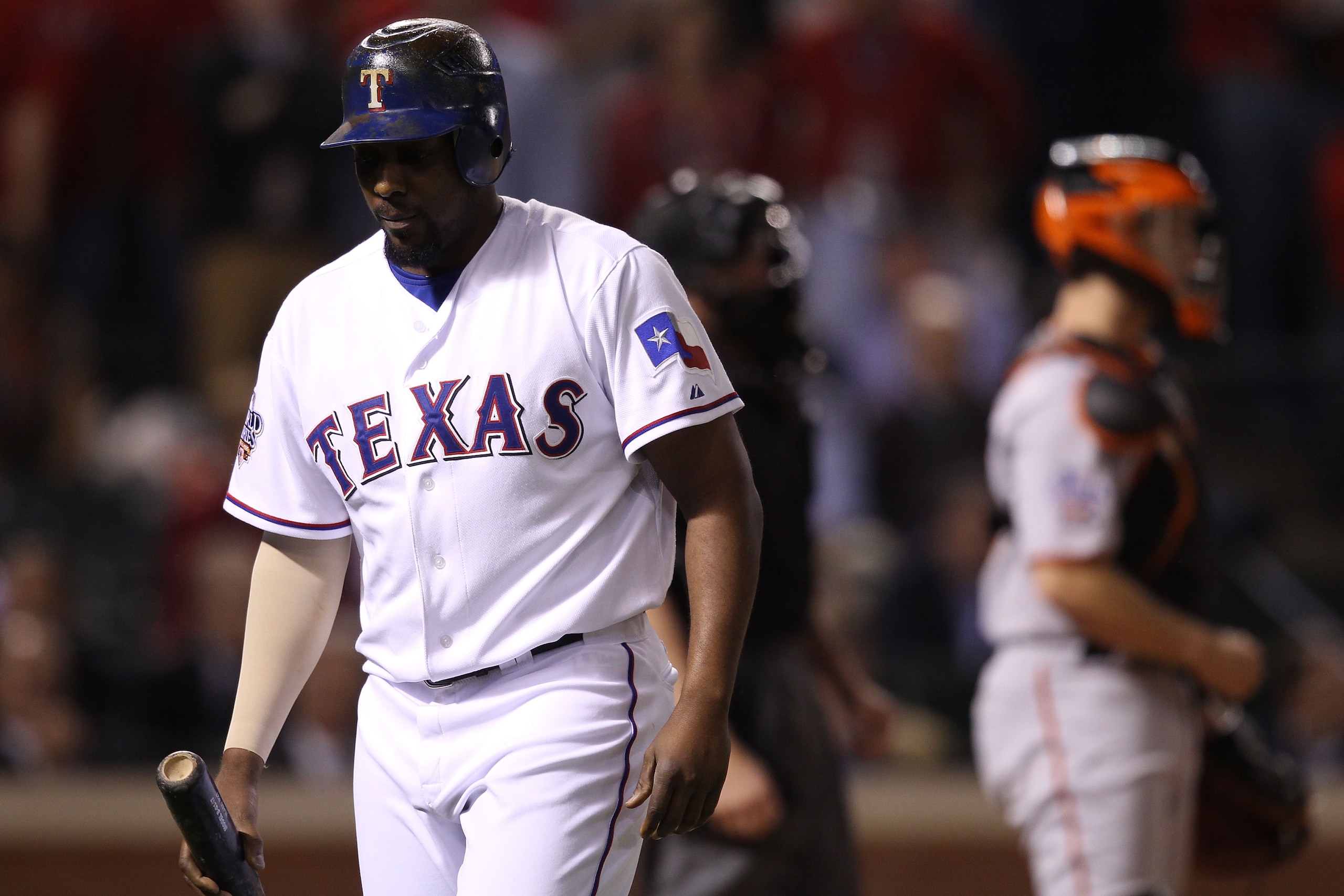 ARLINGTON, TX - OCTOBER 31:  Vladimir Guerrero #27 of the Texas Rangers reacts after he struck out in the seventh inning against the San Francisco Giants in Game Four of the 2010 MLB World Series at Rangers Ballpark in Arlington on October 31, 2010 in Arl