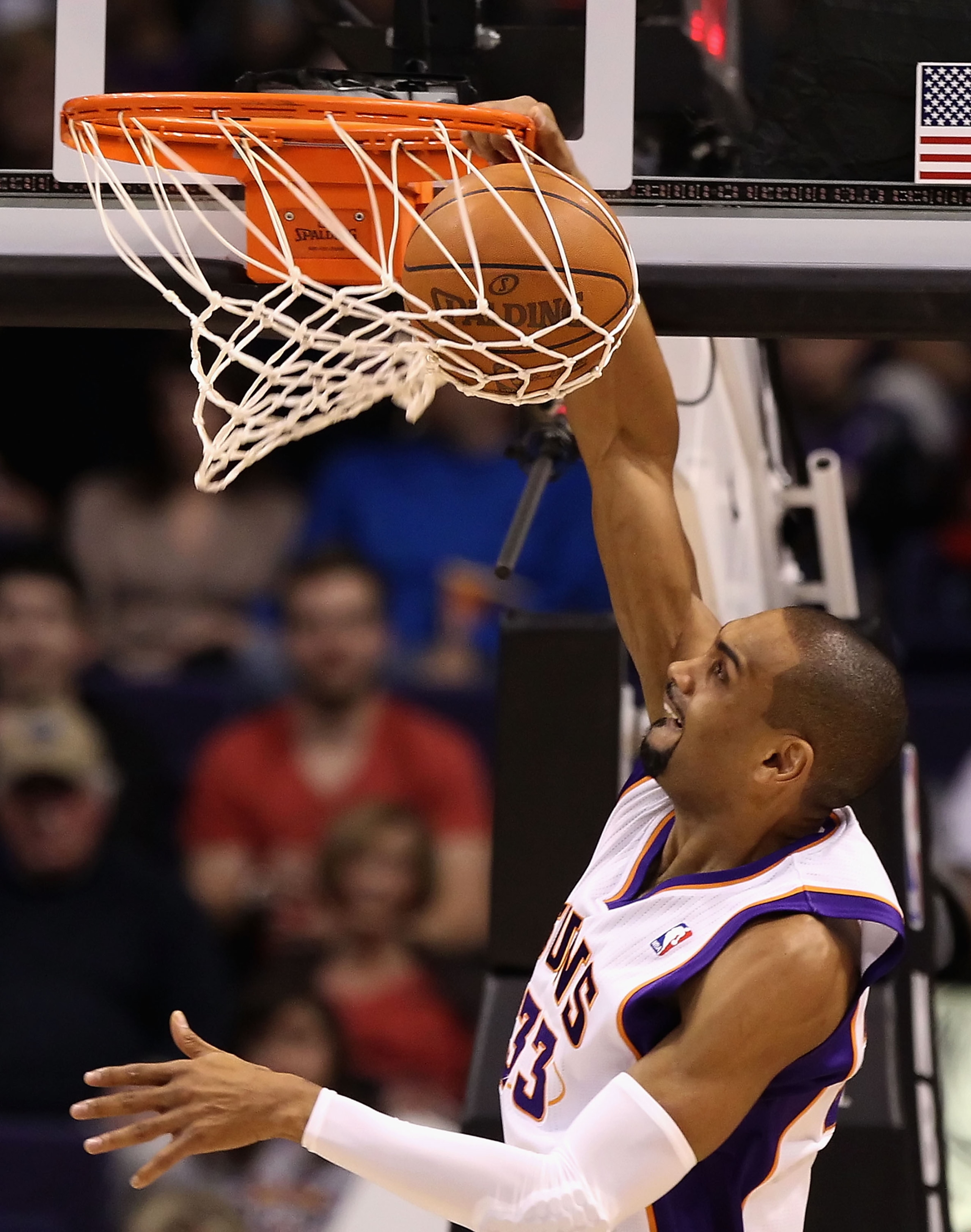 PHOENIX, AZ - JANUARY 14: Grant Hill #33 of the Phoenix Suns slam dunks the ball during the NBA game against the Portland Trail Blazers at US Airways Center on January 14, 2011 in Phoenix, Arizona. The Suns defeated the Trail Blazers 115-111. NOTE TO USE PHOENIX, AZ - JANUARY 14: Grant Hill #33 of the Phoenix Suns slam dunks the ball during the NBA game against the Portland Trail Blazers at US Airways Center on January 14, 2011 in Phoenix, Arizona. The Suns defeated the Trail Blazers 115-111. NOTE TO USE