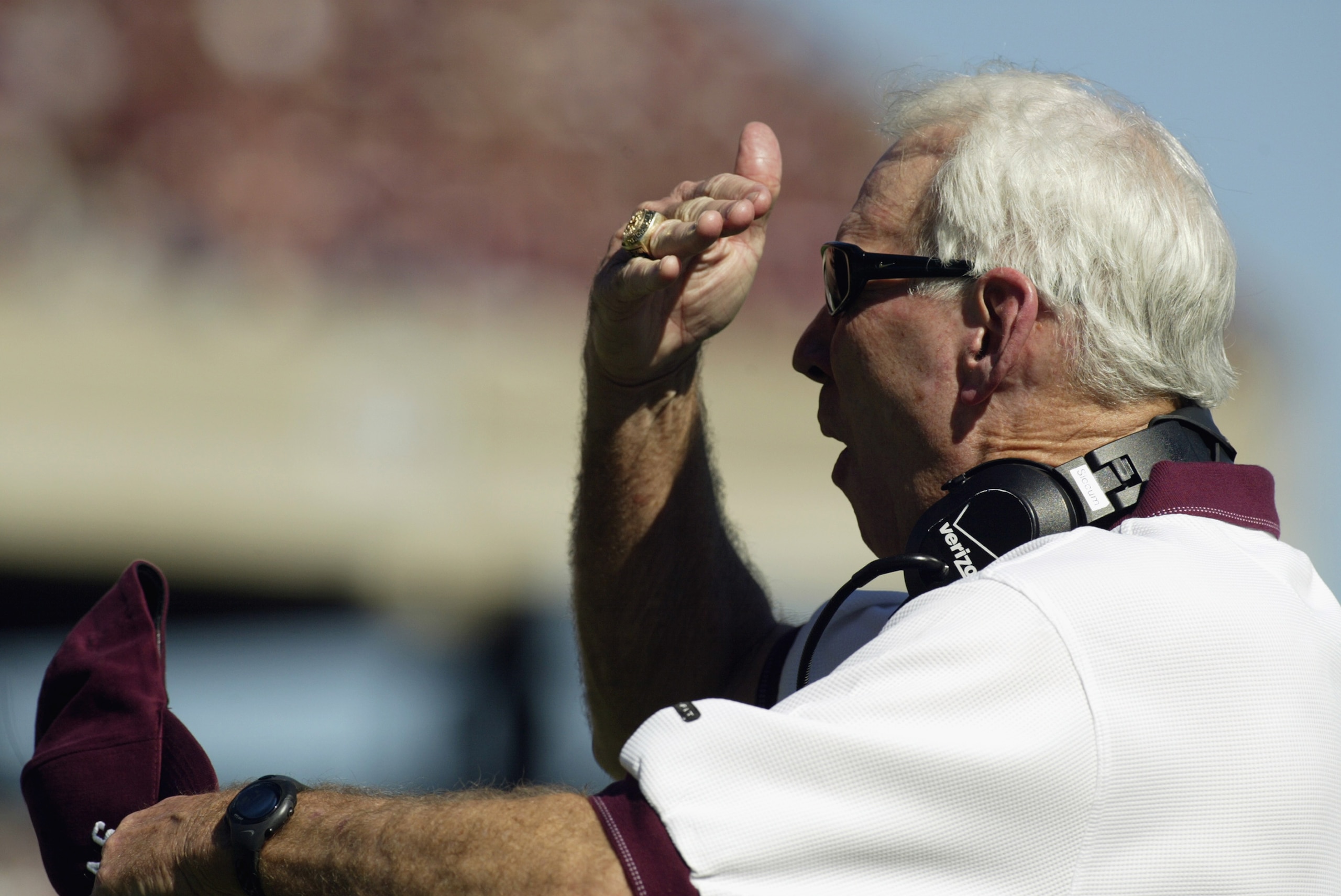 COLLEGE STATION, TX - SEPTEMBER 21:  Head coach R.C. Slocum of the Texas A&M Aggies holds his hands over his eyes during the NCAA football game against the Virginia Tech Hokies on September 21, 2002 at Kyle Field in College Station, Texas. The Hokies won