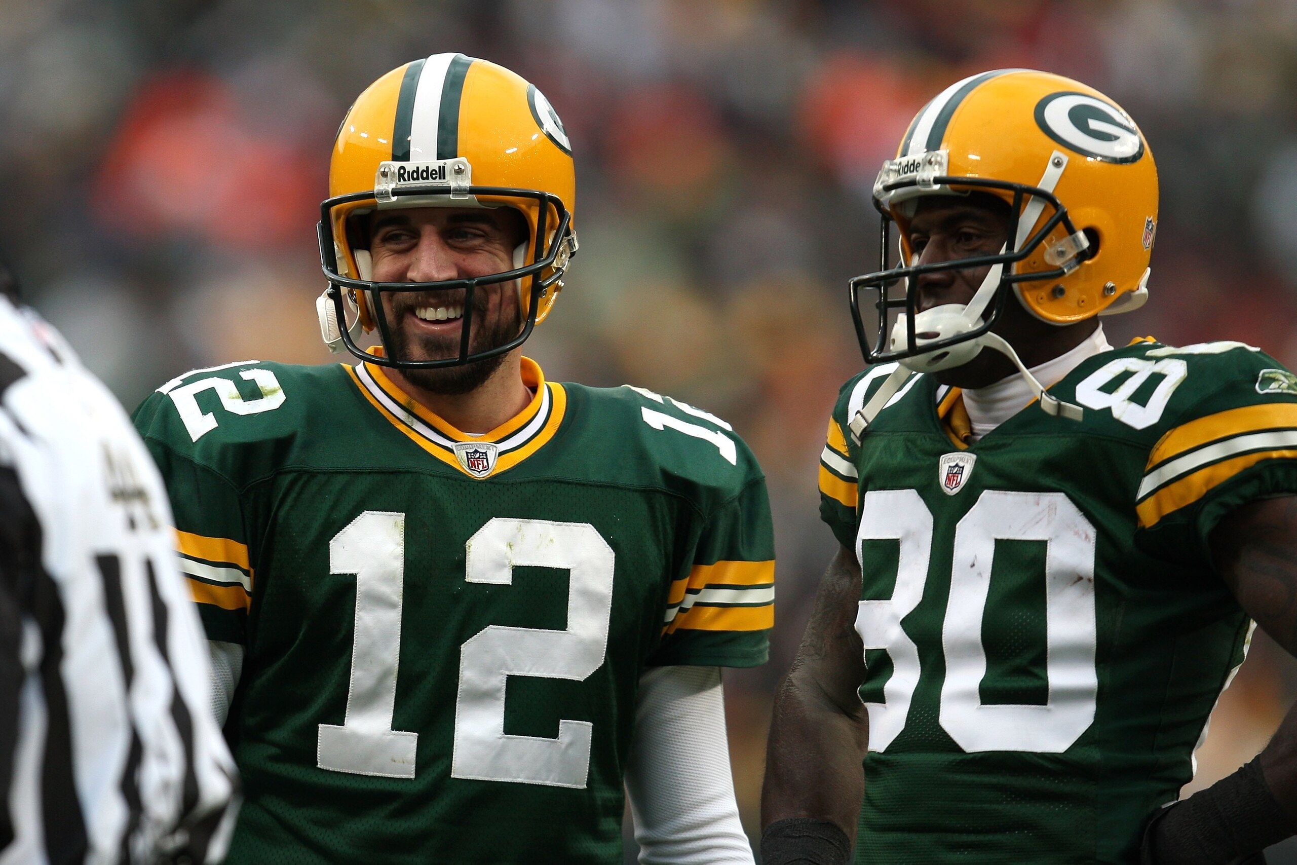 GREEN BAY, WI - NOVEMBER 30:  Aaron Rodgers #12 and Donald Driver #80  of the Green Bay Packers look on against the Carolina Panthers at Lambeau Field on November 30, 2008 in Green Bay, Wisconsin. The Panthers won 35-31.  (Photo by Jonathan Daniel/Getty I
