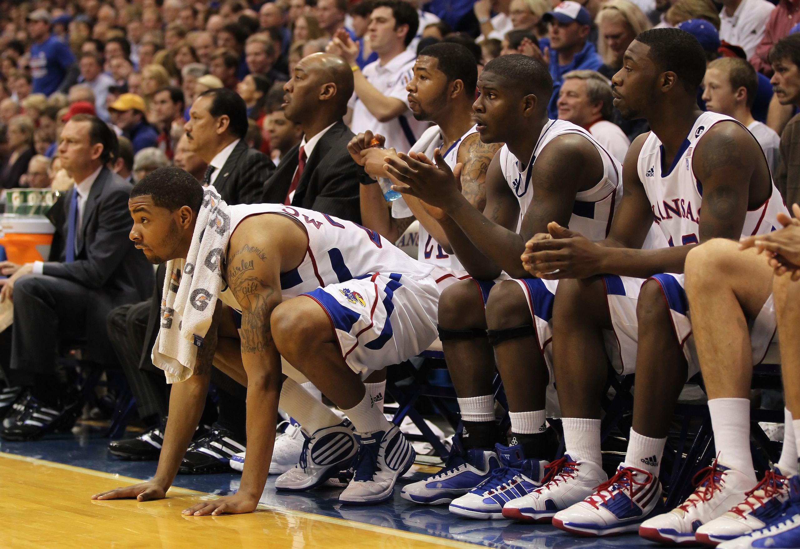 LAWRENCE, KS - JANUARY 29:  Marcus Morris #22 of the Kansas Jayhawks and teammates cheer from the bench during the game against the Kansas State Wildcats on January 29, 2011 at Allen Fieldhouse in Lawrence, Kansas.  (Photo by Jamie Squire/Getty Images)