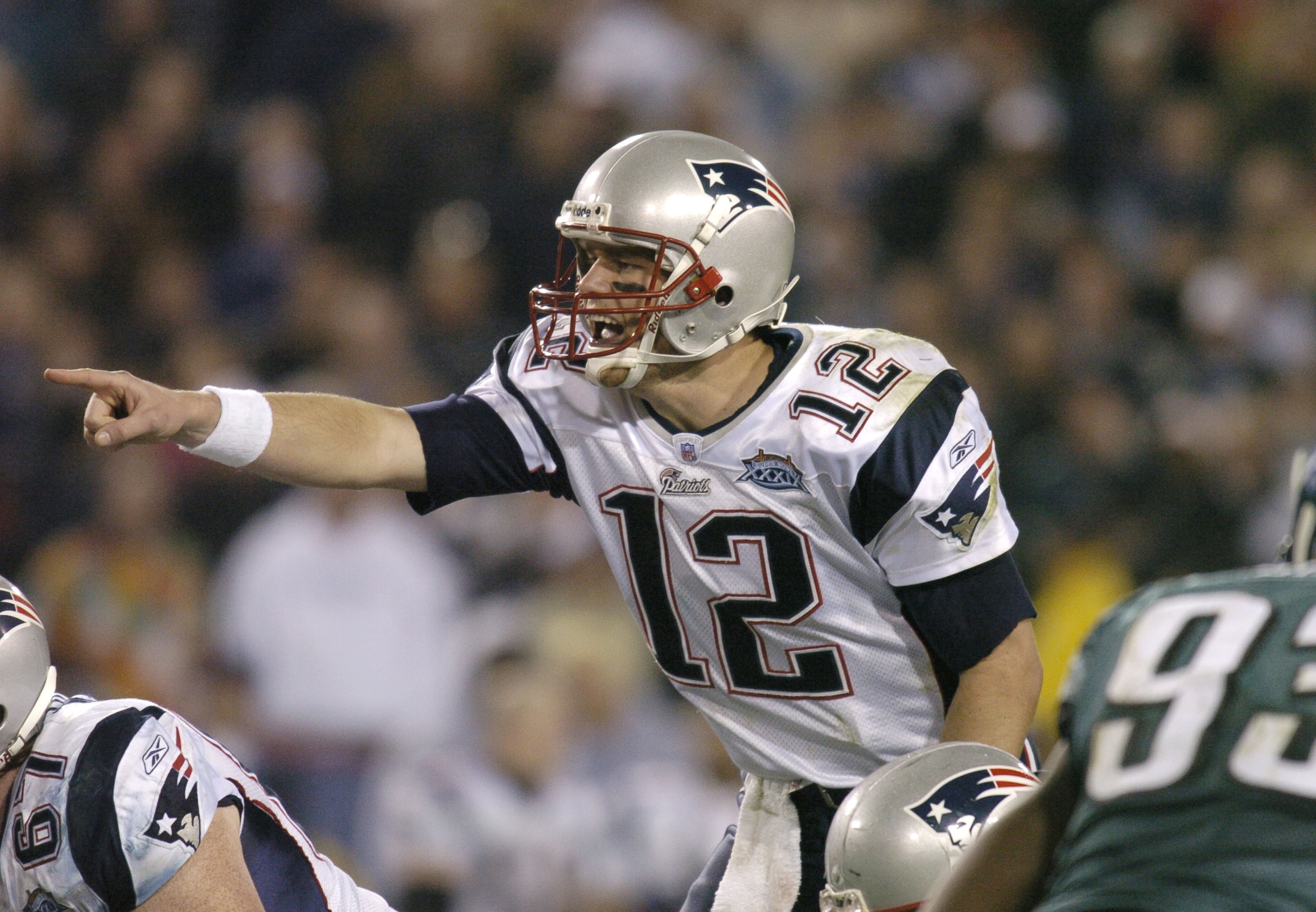 New England Patriots QB Tom Brady #12 makes a call during Super Bowl XXXIX between the Philadelphia Eagles and the New England Patriots at Alltel Stadium in Jacksonville, Florida on February 6, 2005. (Photo by Al Messerschmidt/Getty Images) New England Patriots QB Tom Brady #12 makes a call during Super Bowl XXXIX between the Philadelphia Eagles and the New England Patriots at Alltel Stadium in Jacksonville, Florida on February 6, 2005. (Photo by Al Messerschmidt/Getty Images)