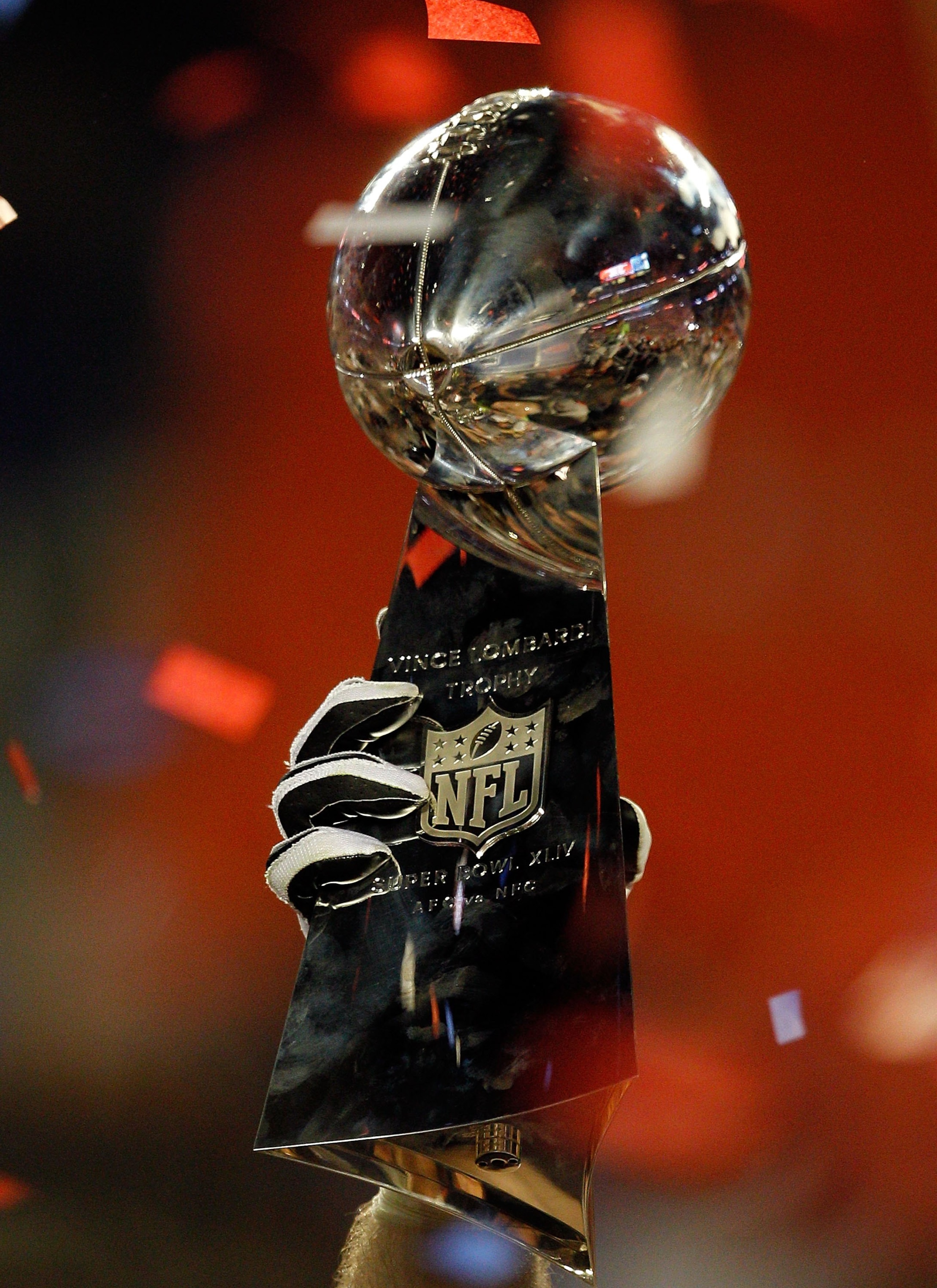 MIAMI GARDENS, FL - FEBRUARY 07:  A detail of the Vince Lombardi Trophy as the New Orleans Saints celebrate after defeating the Indianapolis Colts during Super Bowl XLIV on February 7, 2010 at Sun Life Stadium in Miami Gardens, Florida.  (Photo by Jonatha
