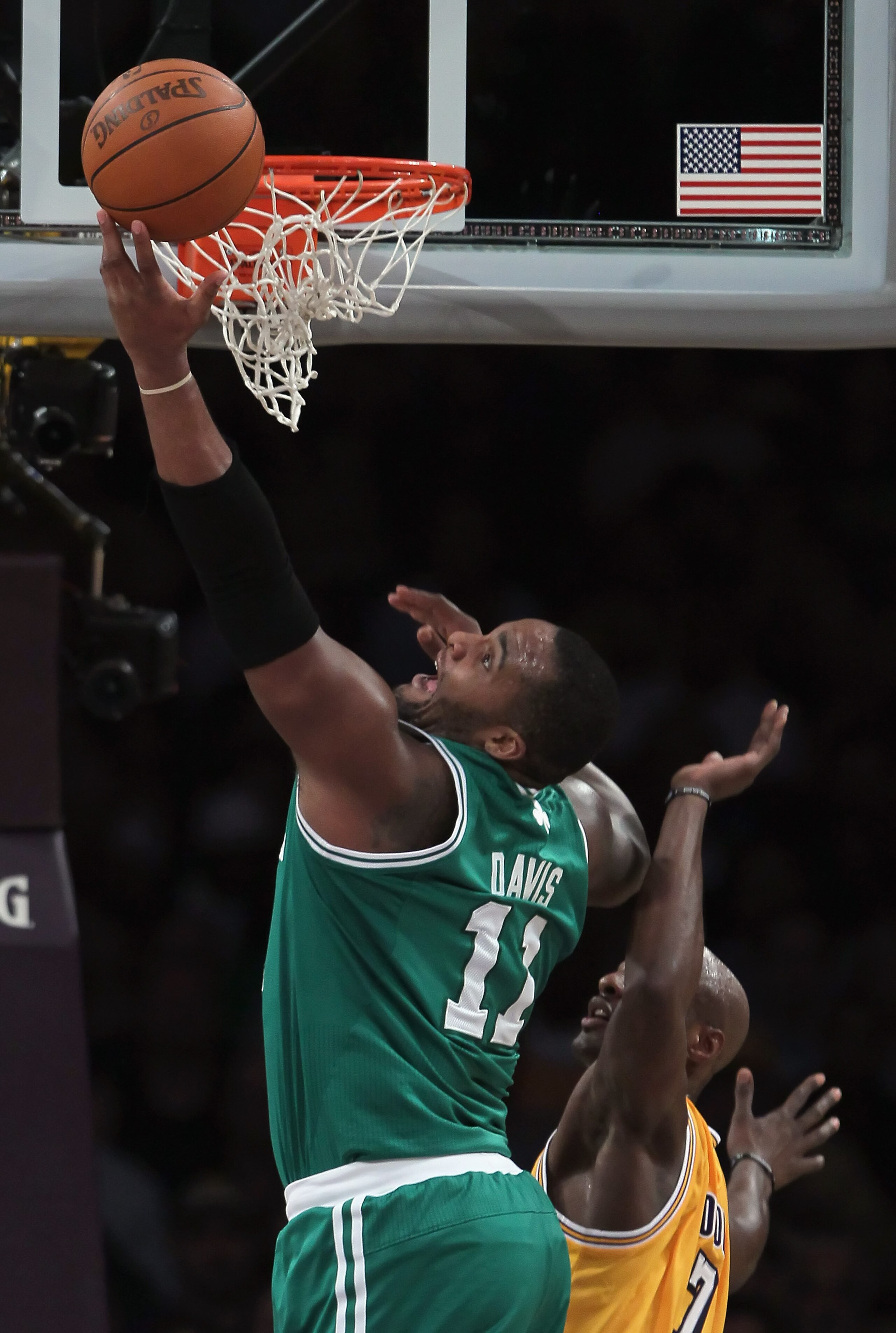 LOS ANGELES, CA - JANUARY 30: Glen Davis #11 of the Boston Celtics drives to the basket past Lamar Odom #7 of the Los Angeles Lakers in the first half at Staples Center on January 30, 2011 in Los Angeles, California. The Celtics defeated the Lakers 109-9 LOS ANGELES, CA - JANUARY 30: Glen Davis #11 of the Boston Celtics drives to the basket past Lamar Odom #7 of the Los Angeles Lakers in the first half at Staples Center on January 30, 2011 in Los Angeles, California. The Celtics defeated the Lakers 109-9