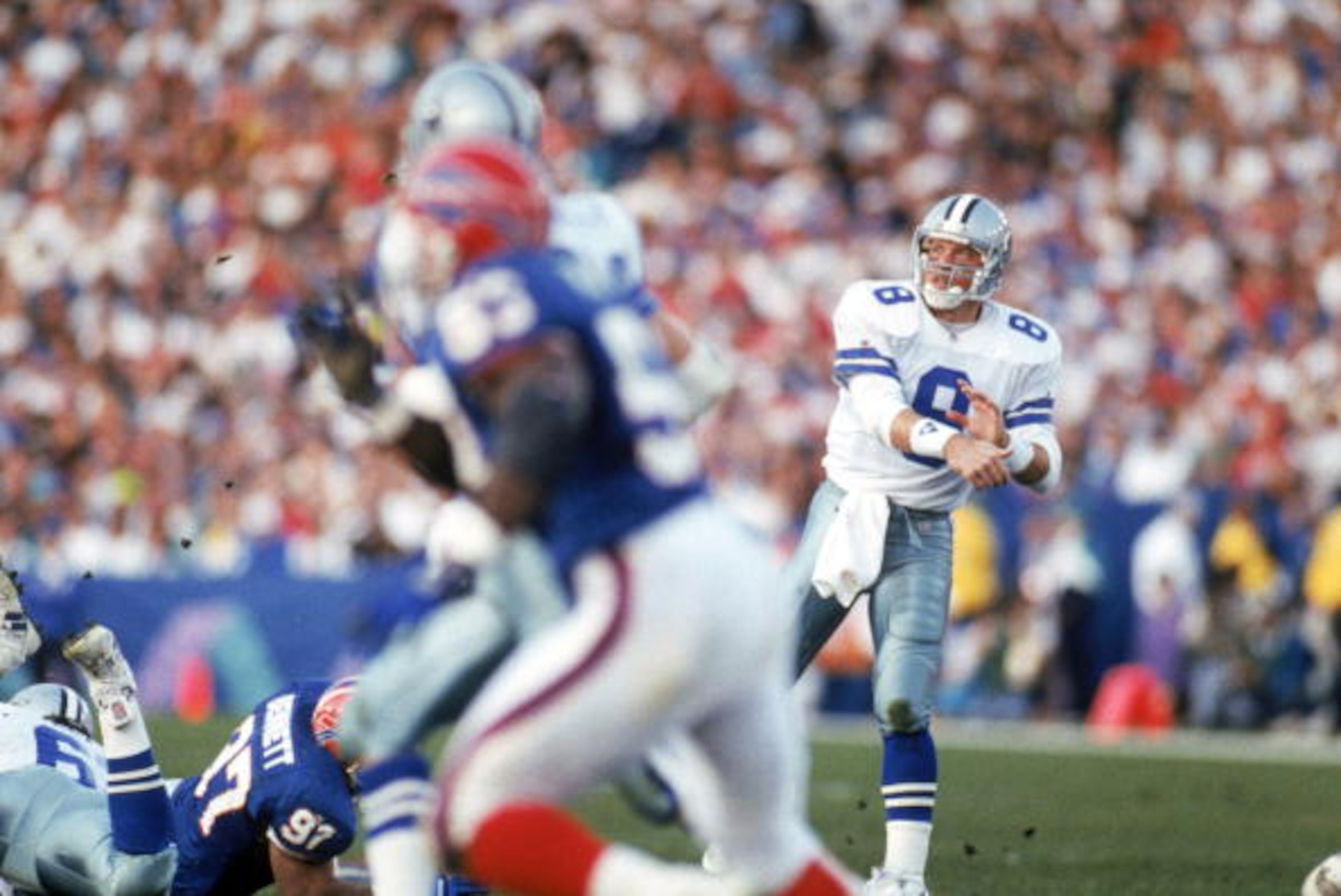 PASADENA, CA - JANUARY 31: Quarterback Troy Aikman #8 of the Dallas Cowboys throws a pass during Super Bowl XXVII against the Buffalo Bills at the Rose Bowl on January 31, 1993 in Pasadena, California. The Cowboys won 52-17. (Photo by George Rose/Getty PASADENA, CA - JANUARY 31: Quarterback Troy Aikman #8 of the Dallas Cowboys throws a pass during Super Bowl XXVII against the Buffalo Bills at the Rose Bowl on January 31, 1993 in Pasadena, California. The Cowboys won 52-17. (Photo by George Rose/Getty